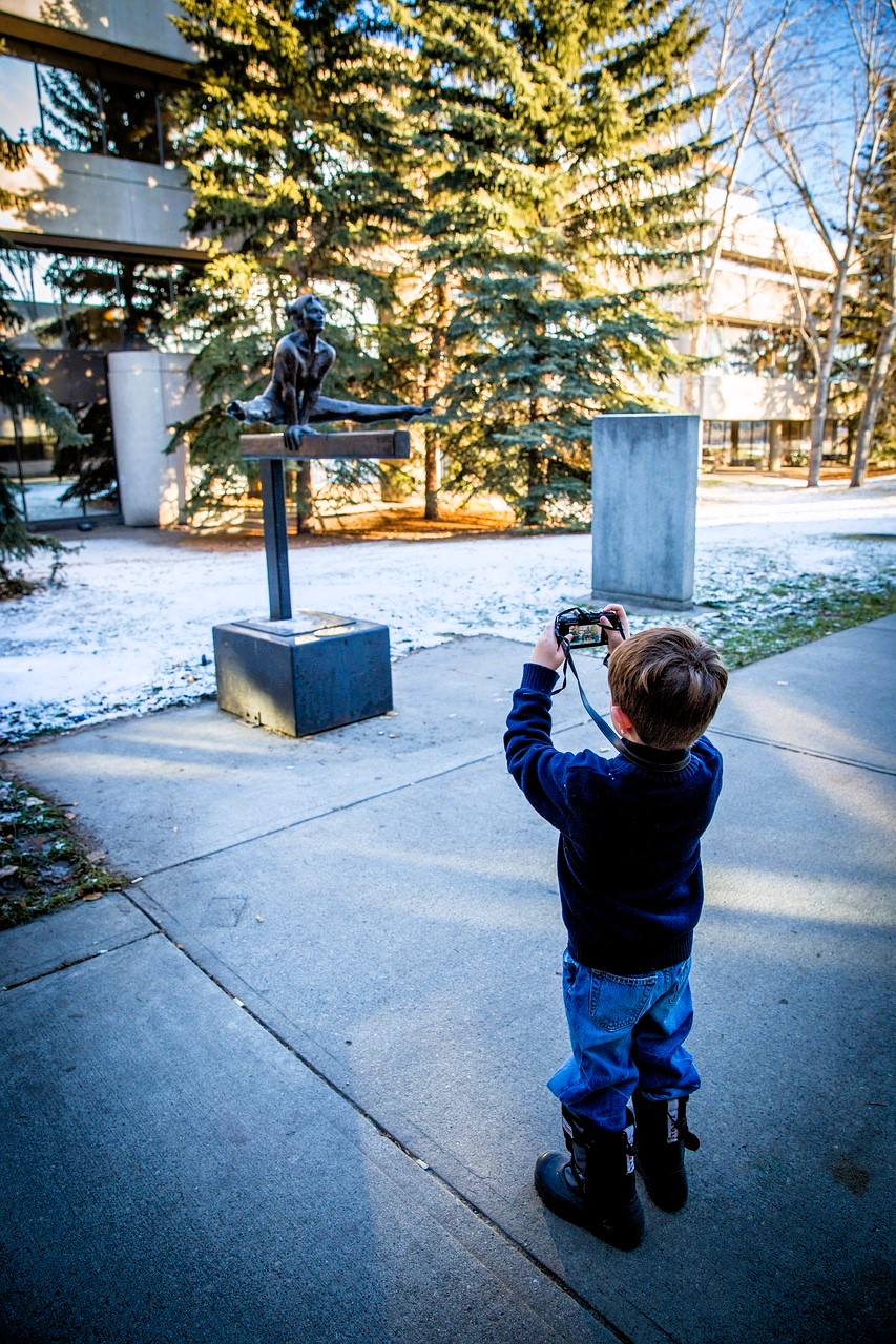 Fotógrafo, niño y aprendiz