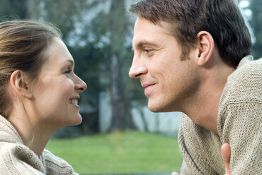 Man and woman staring at each other