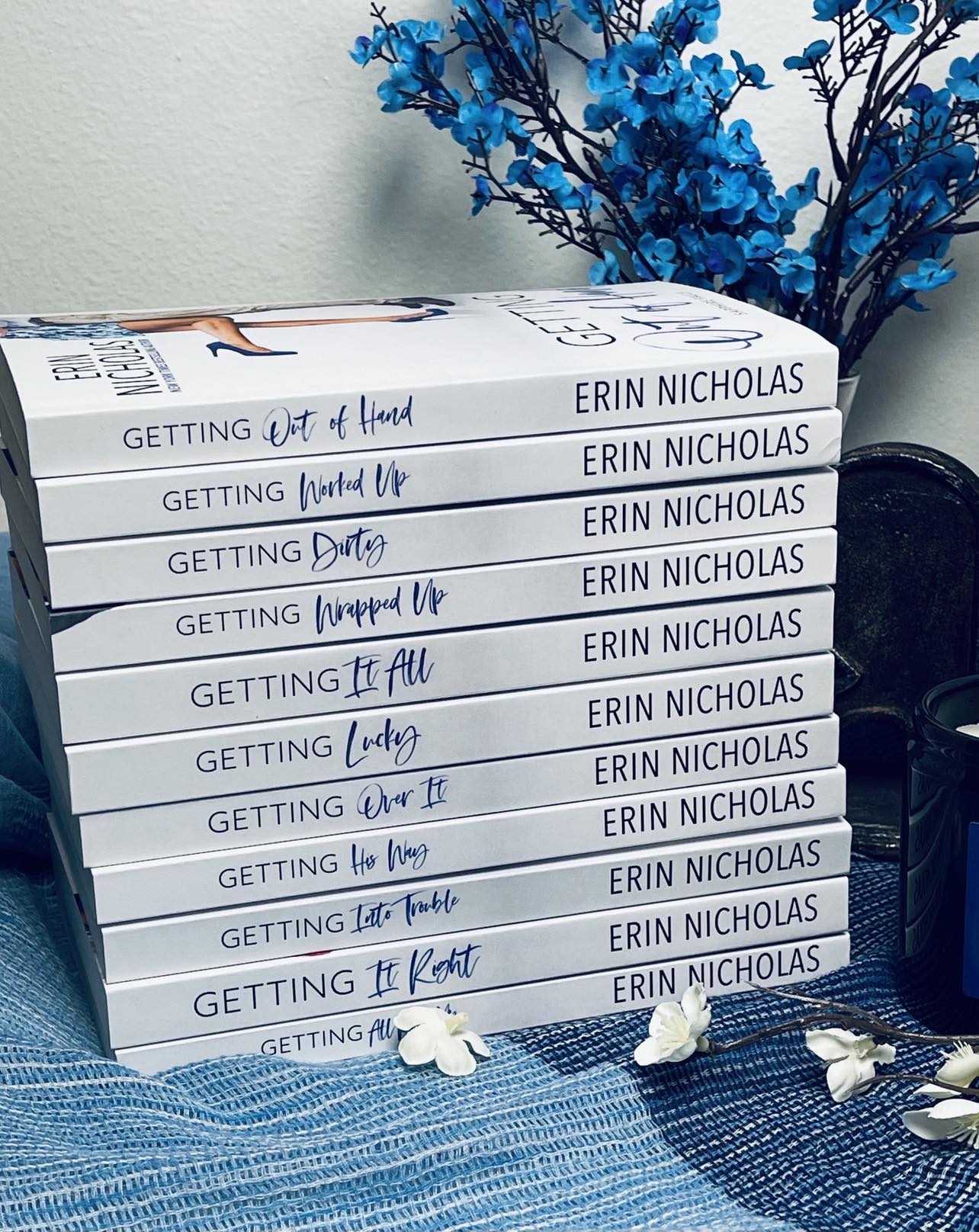Paperback spines of entire Sapphire Falls series by Erin Nicholas