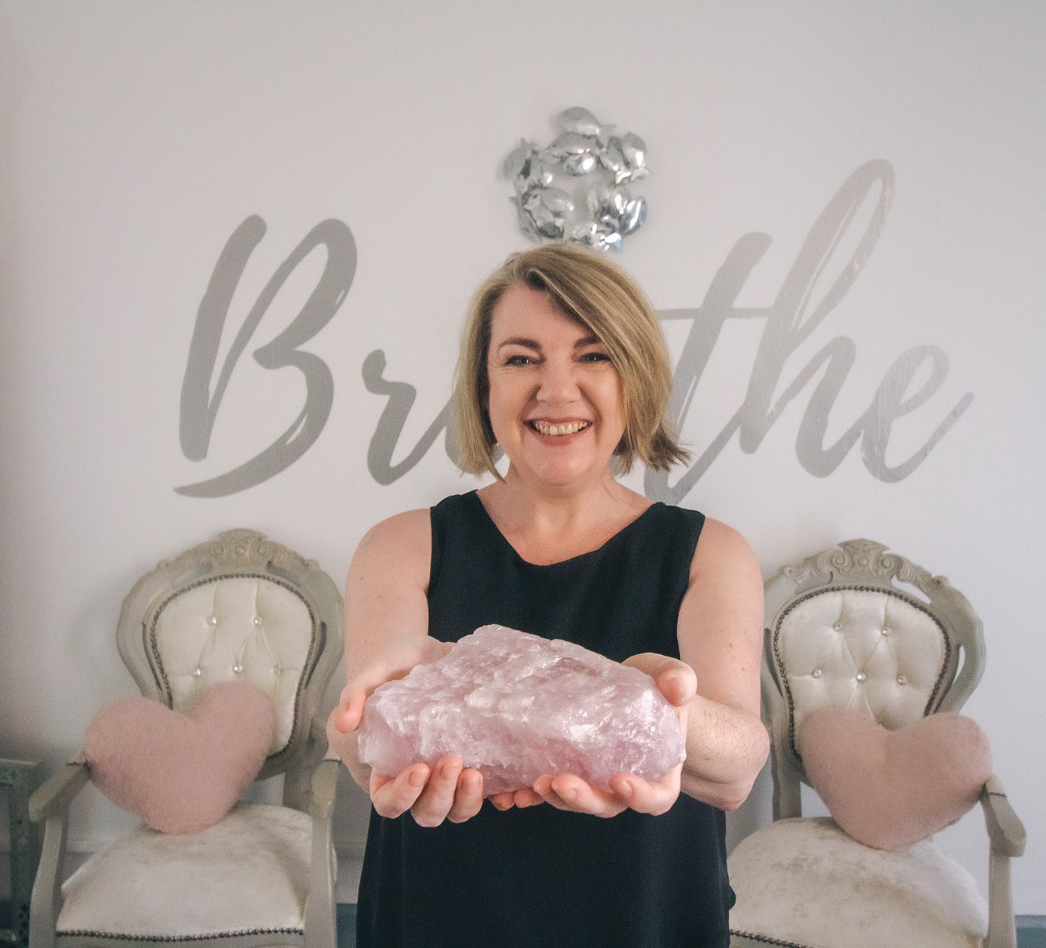 woman, rose quartz, breathe, chair, cushions, guru circles