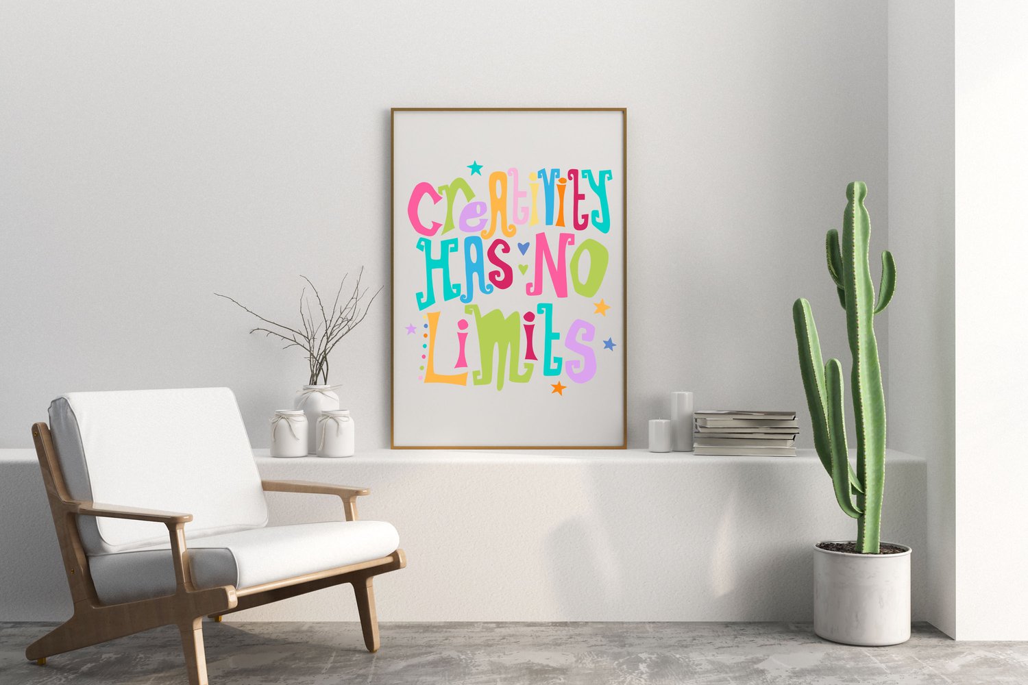 A downloadable print with a hand lettered design which says ‘creativity has no limits’ in a range of bright colours.