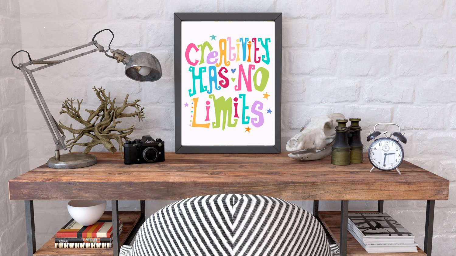 A downloadable print with a hand lettered design which says ‘creativity has no limits’ in a range of bright colours.