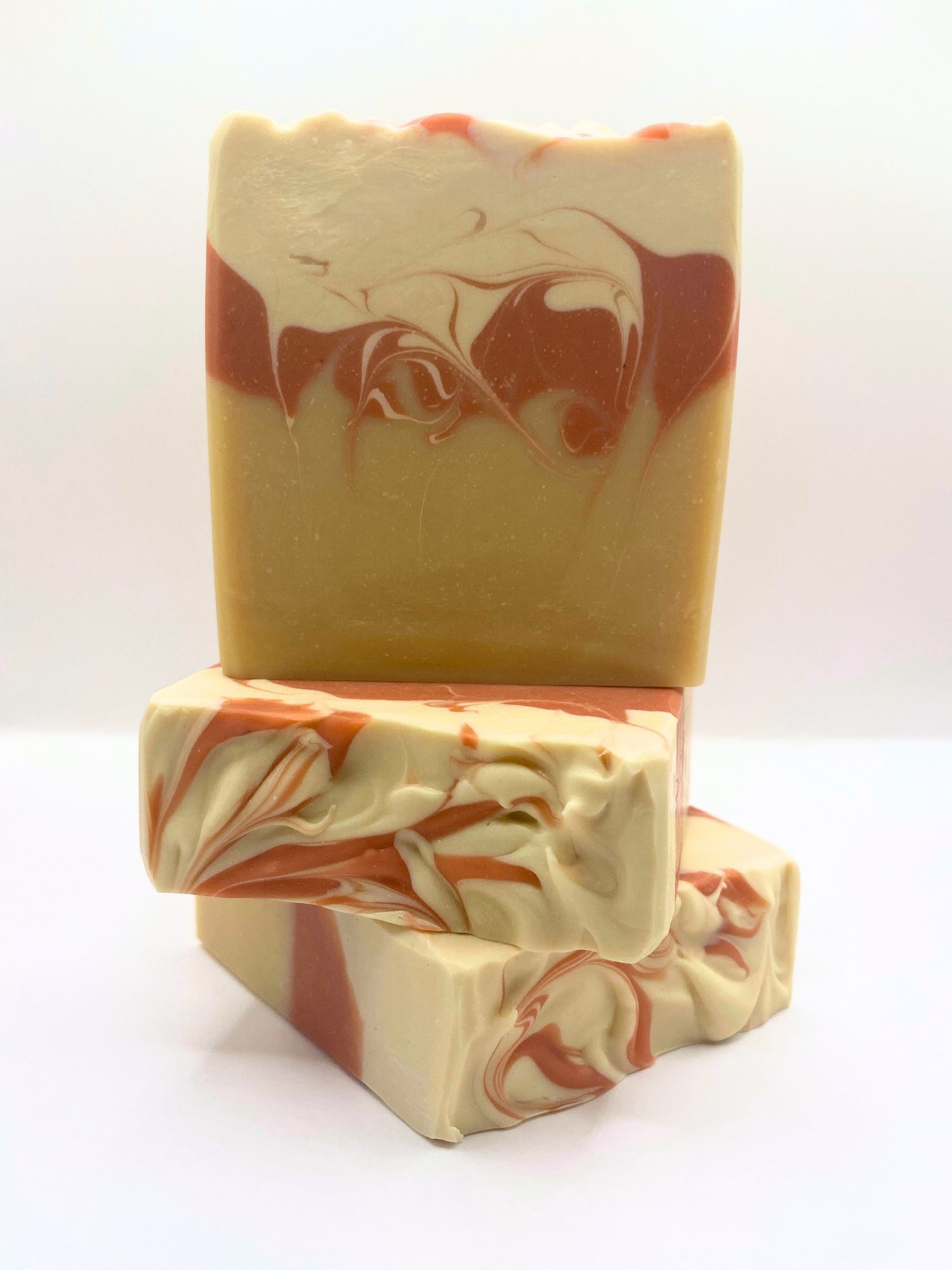 Handmade oat milk soap bars swirled with pink French clay