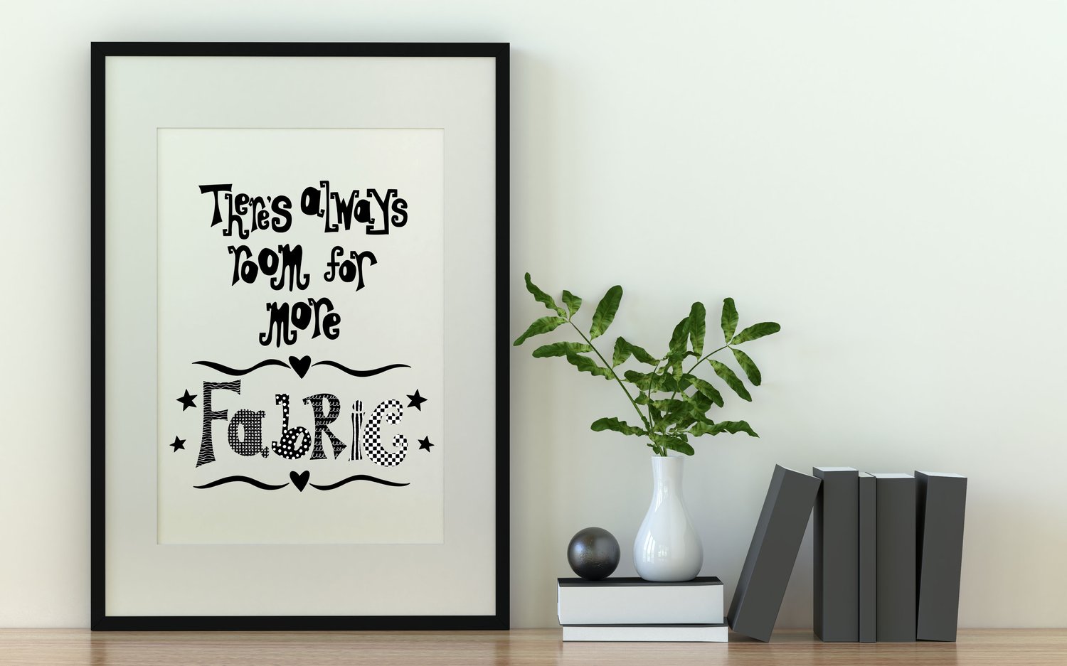 A downloadable print with a hand lettered design which says ‘there’s always room for more fabric’ in black.