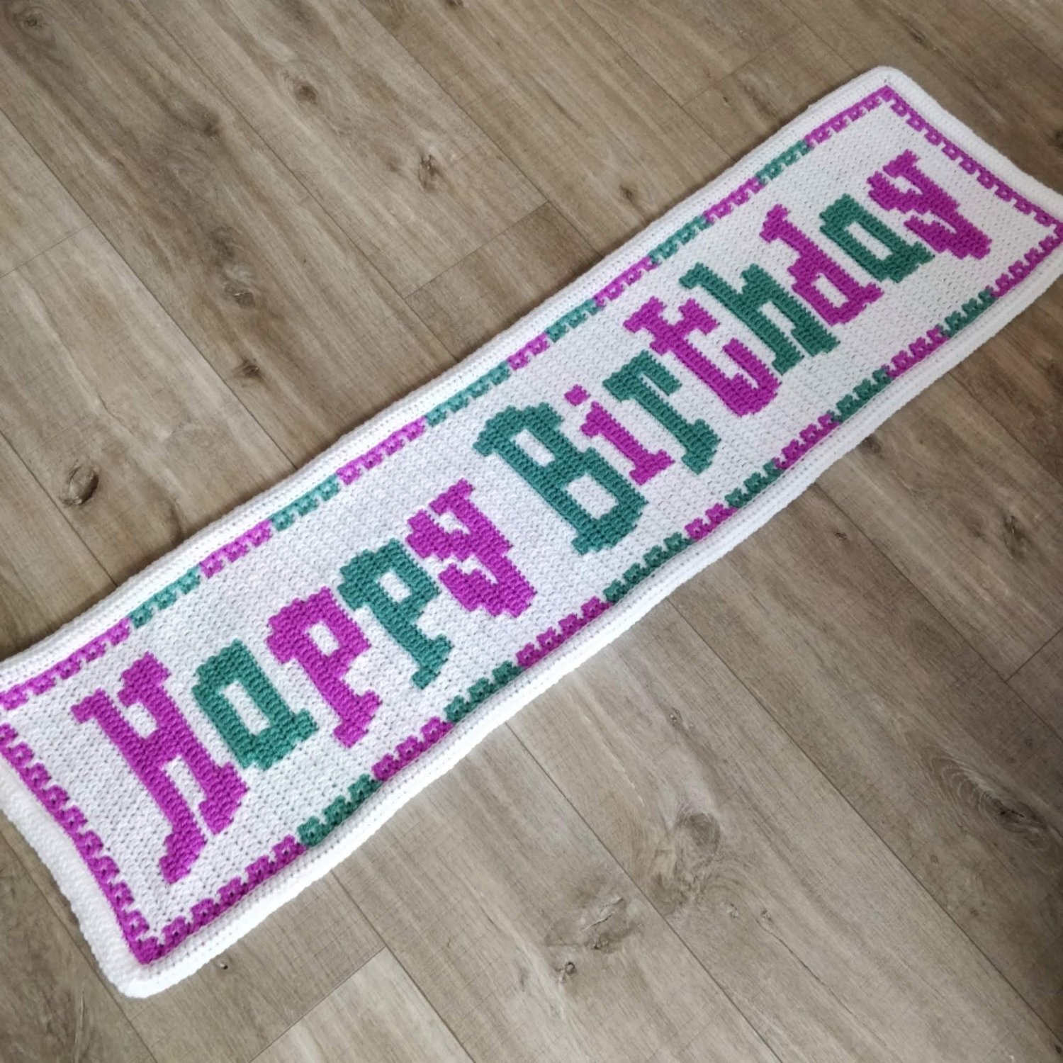 Crocheted banner showing Happy Birthday