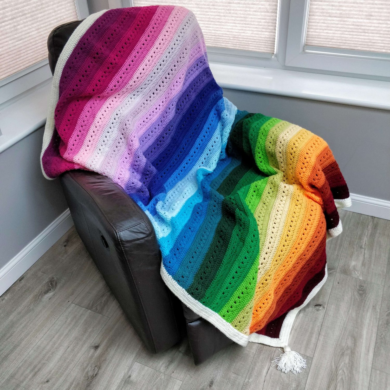 Chair with crochet striped blanket