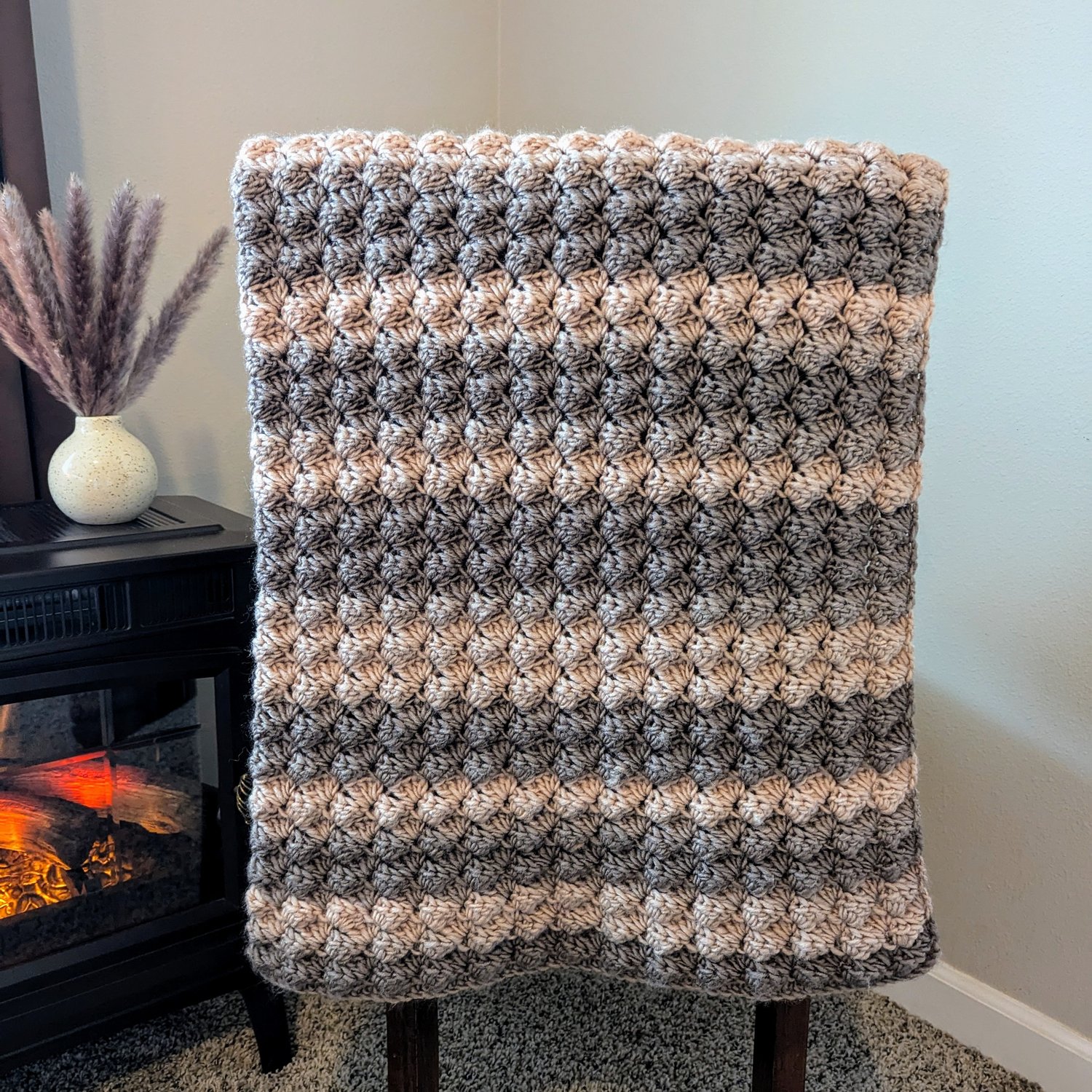Woodland Crochet Blanket Pattern on chair