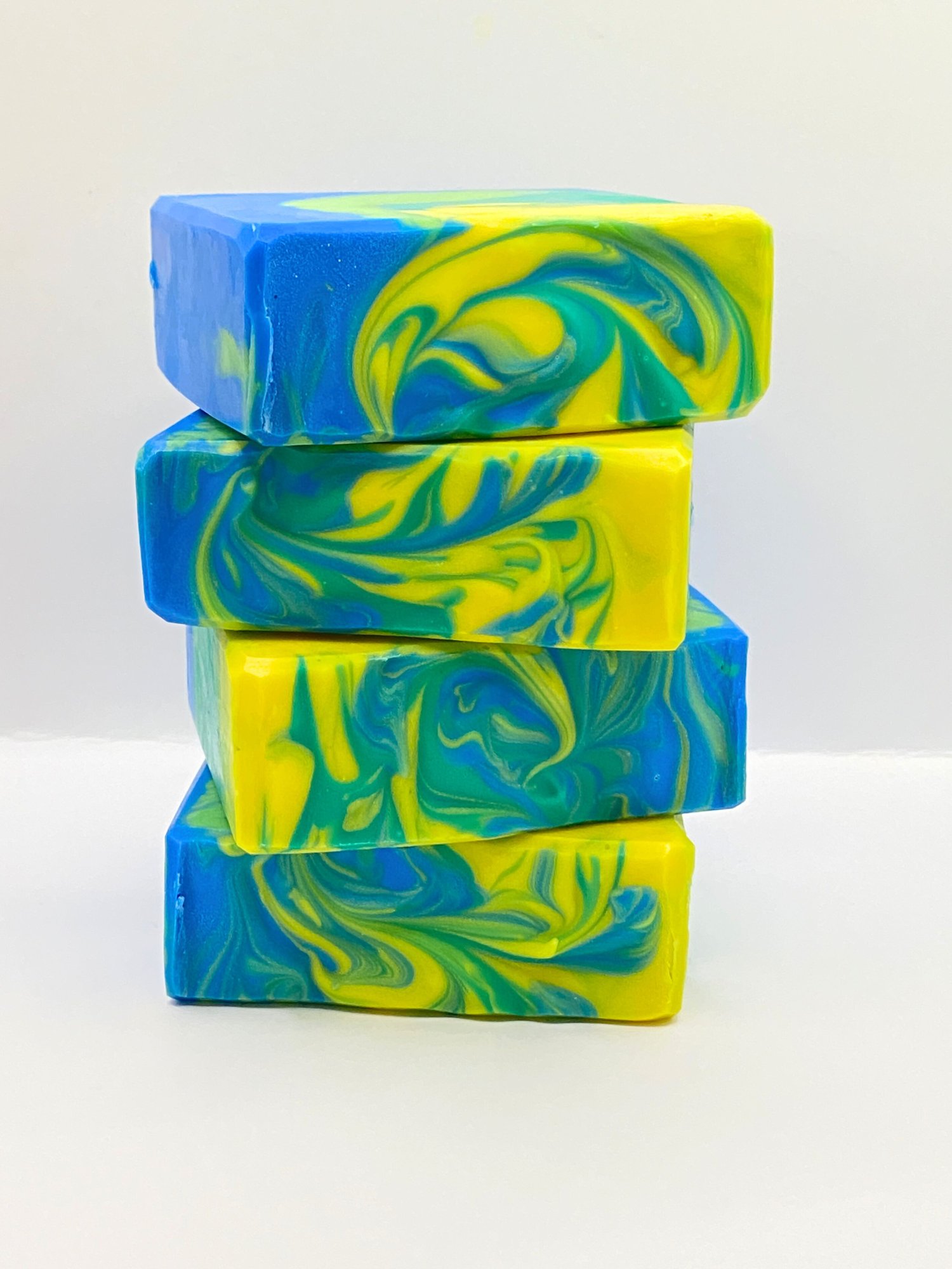 Matecumbe Shores handmade soap swirled in blue, green, teal, and yellow