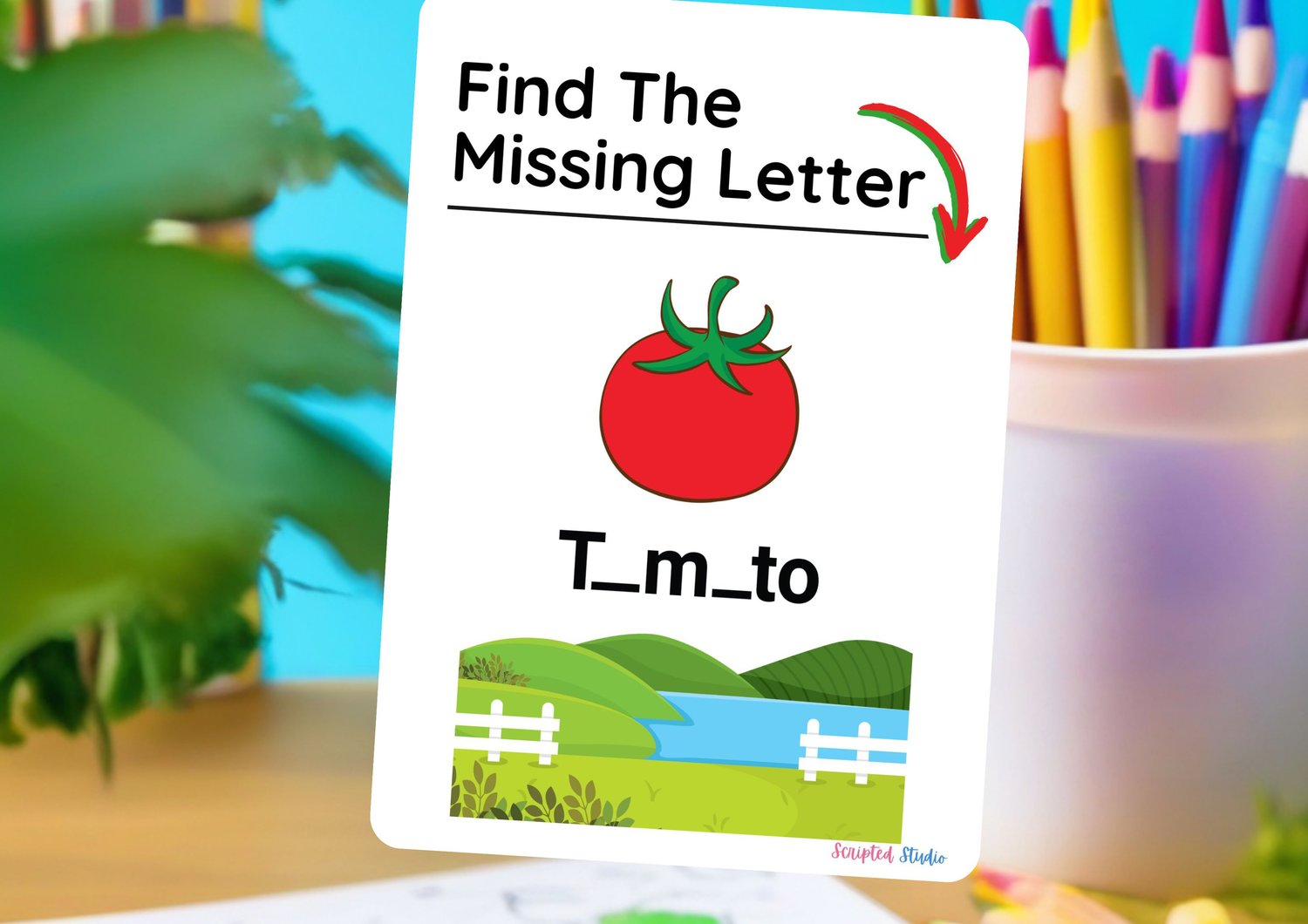 kids-drawing-missing-letter-worksheets on a flashcard on a desk with pencils in a pot