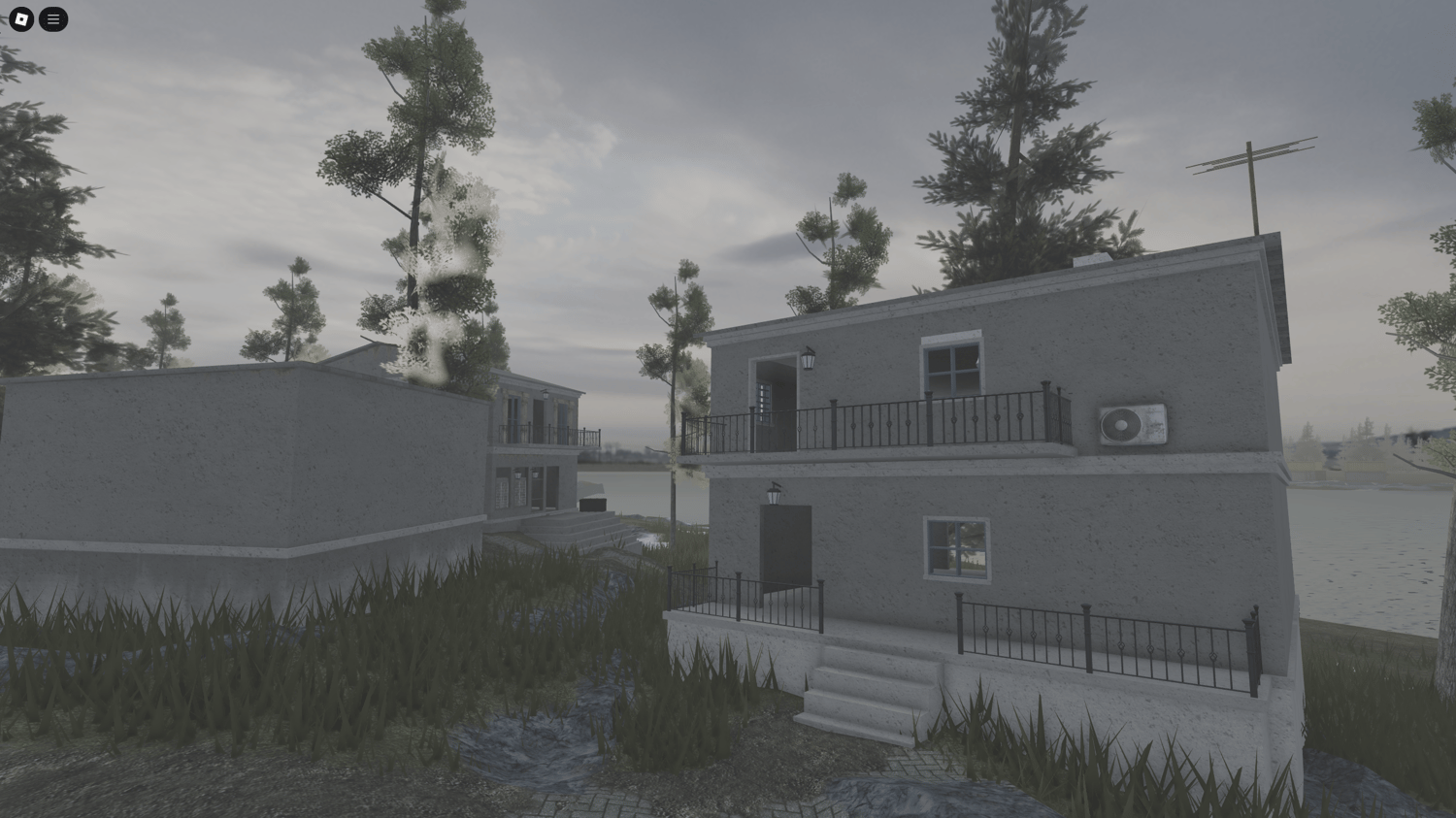 In-game depiction of a village nestled along the riverbank, serving as a strategic location for missions.
