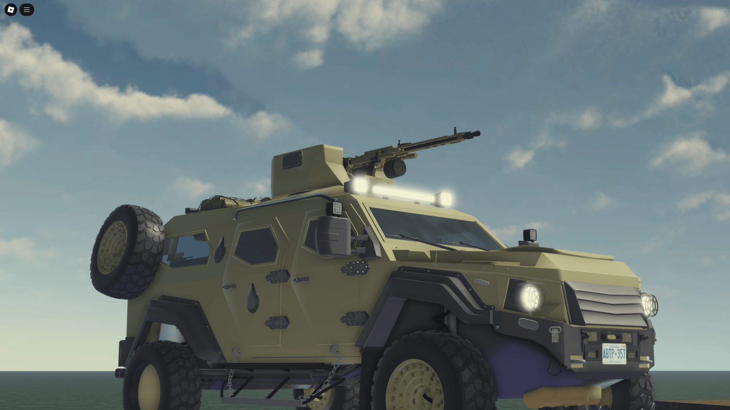 Side profile of the TGAV Military Vehicle navigating rugged terrain, highlighting the flexibility of its wheels.