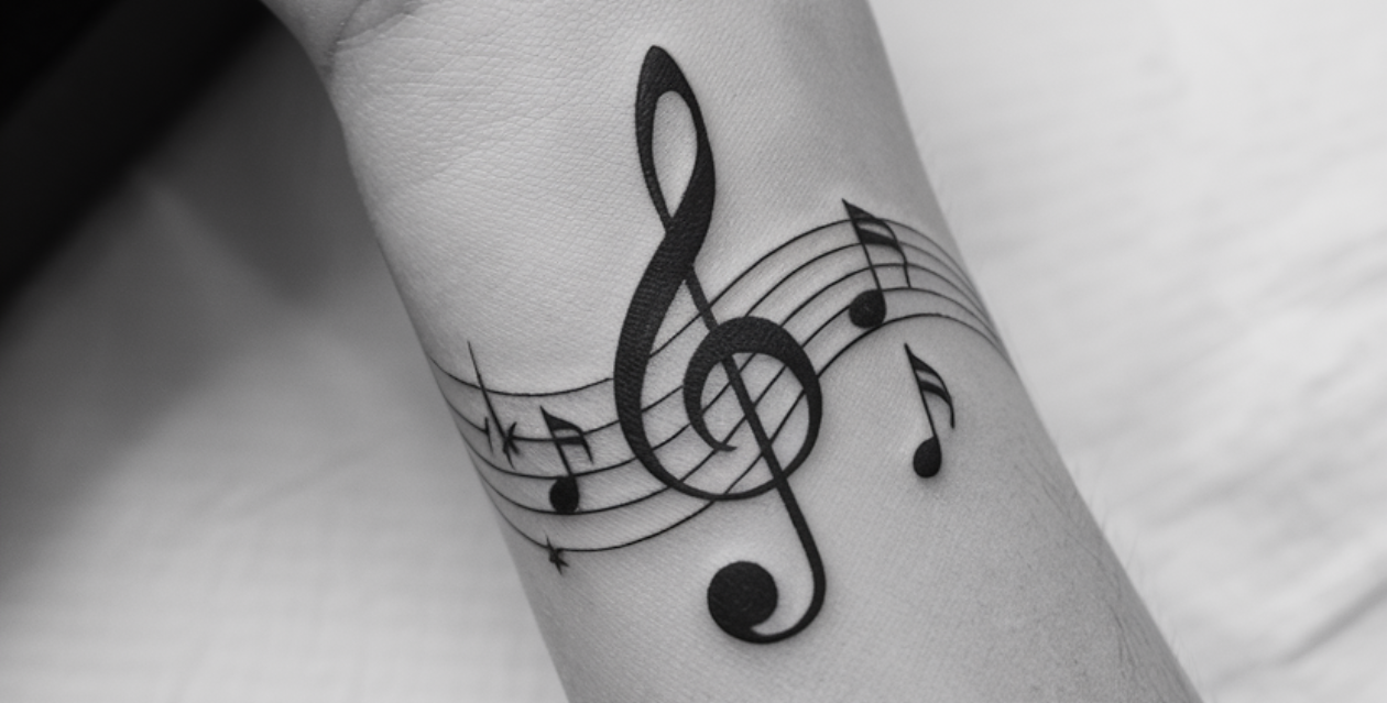Unveiling the Melody: Enchanting Music Symbol Tattoos