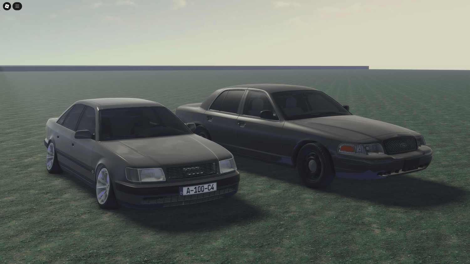 Two simple gray cars parked side by side, perfect for minimalist games.