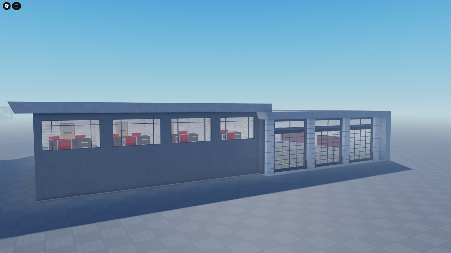 Roblox fire station garage with space for emergency vehicles.