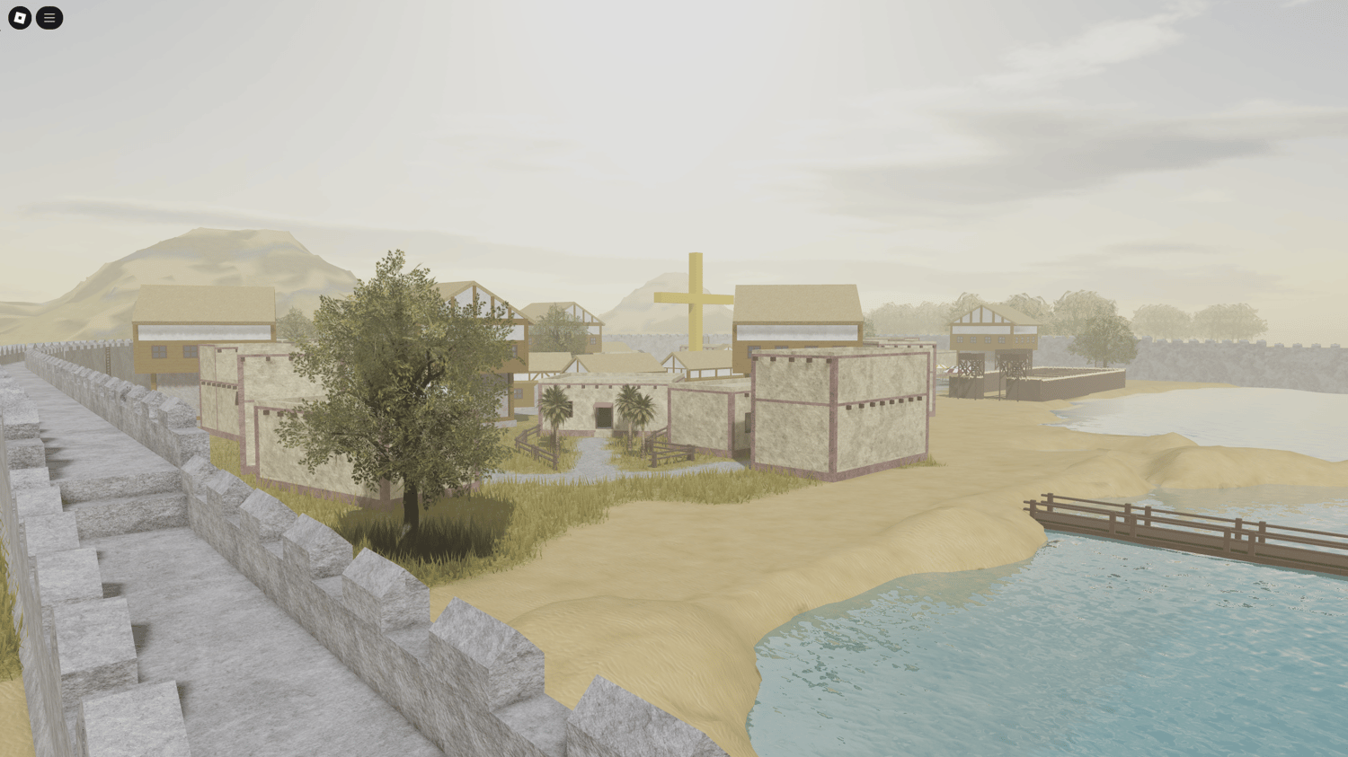 Aerial view of fortified Crusader village surrounded by sandy desert