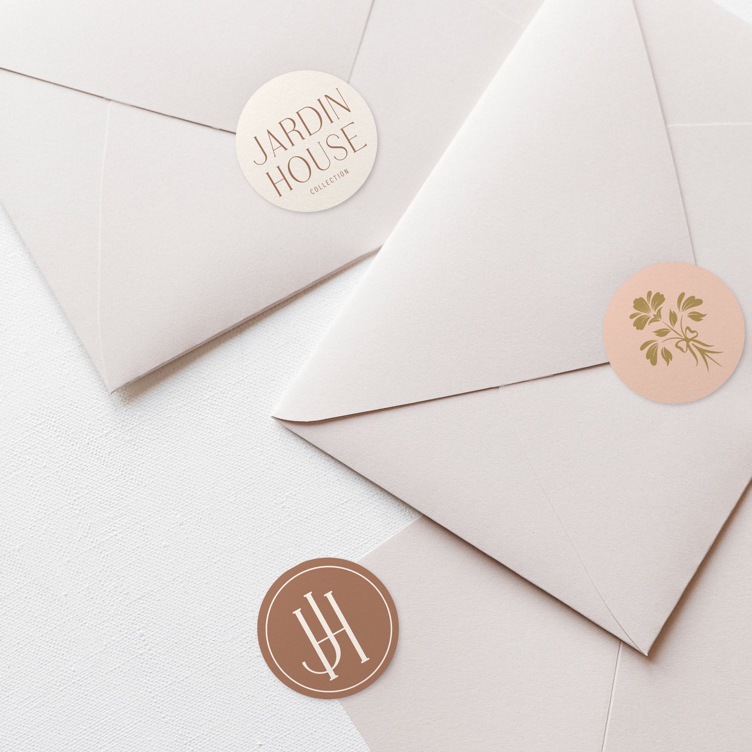 Jardin House logo design featuring a hand drawn floral bouquet tied together with a lovely bow