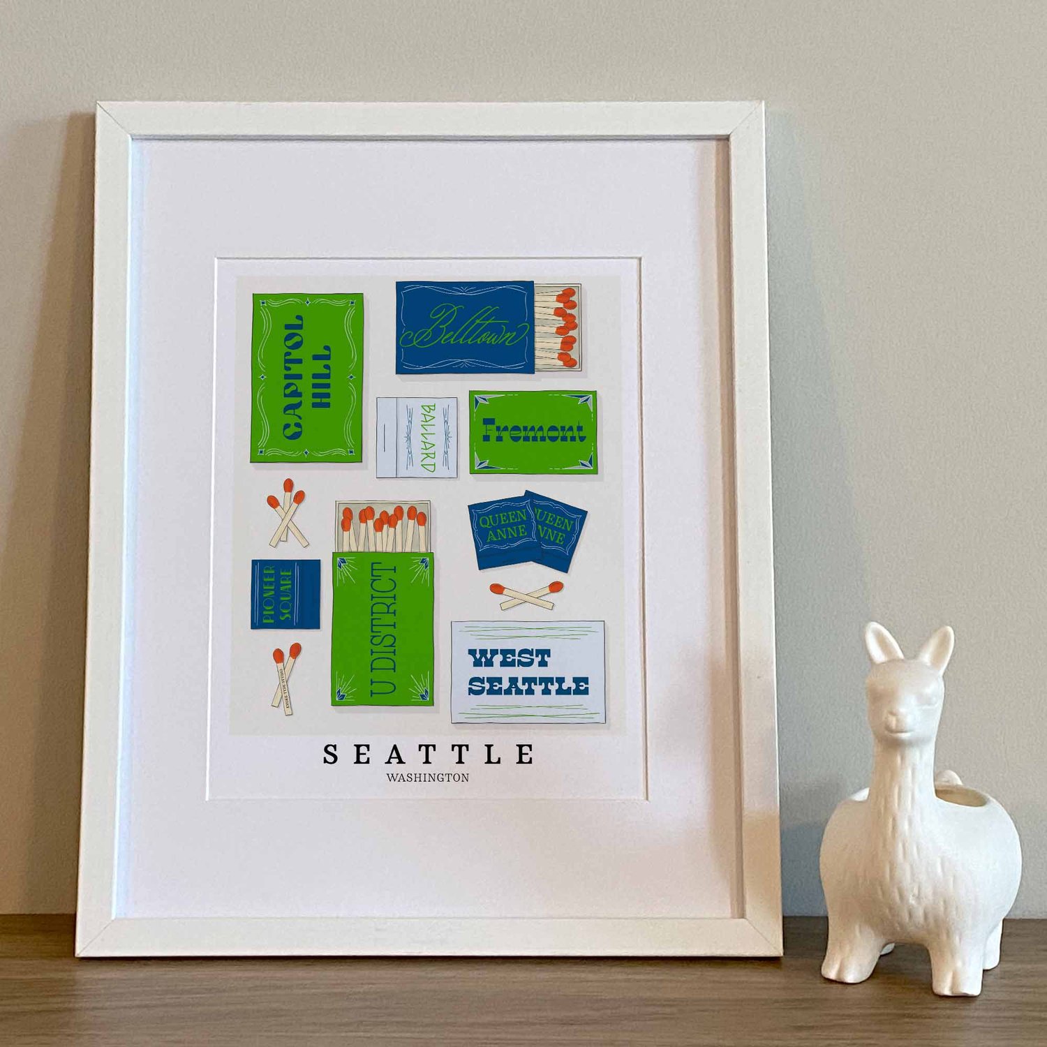 Seattle neighborhood matchbox art print with hand-lettered typography in the Electric Seaboard color palette