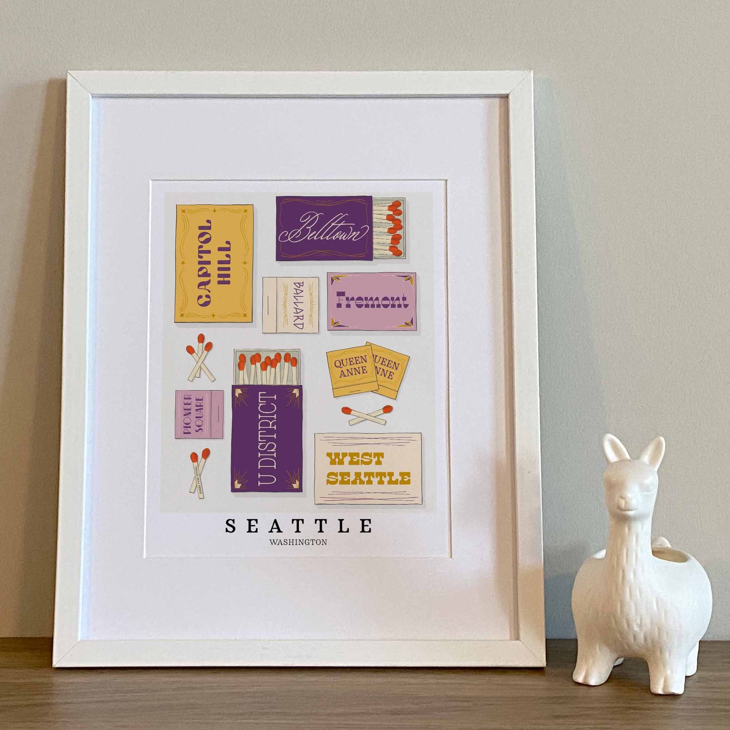 Seattle neighborhood matchbox art print with playful hand-lettered typography in the Purple Haze color palette