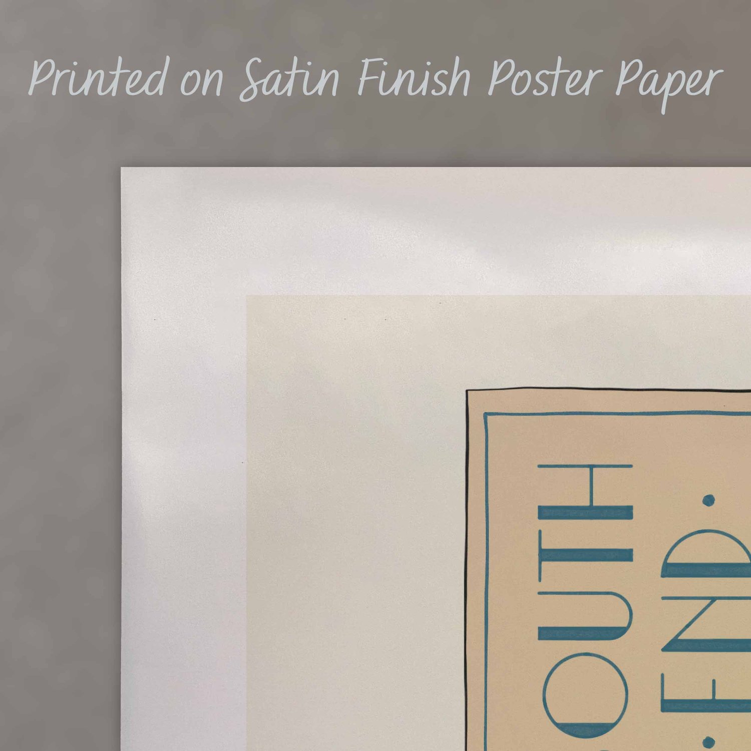 A close up of a poster with text saying “Printed on Satin Finish Poster Paper”