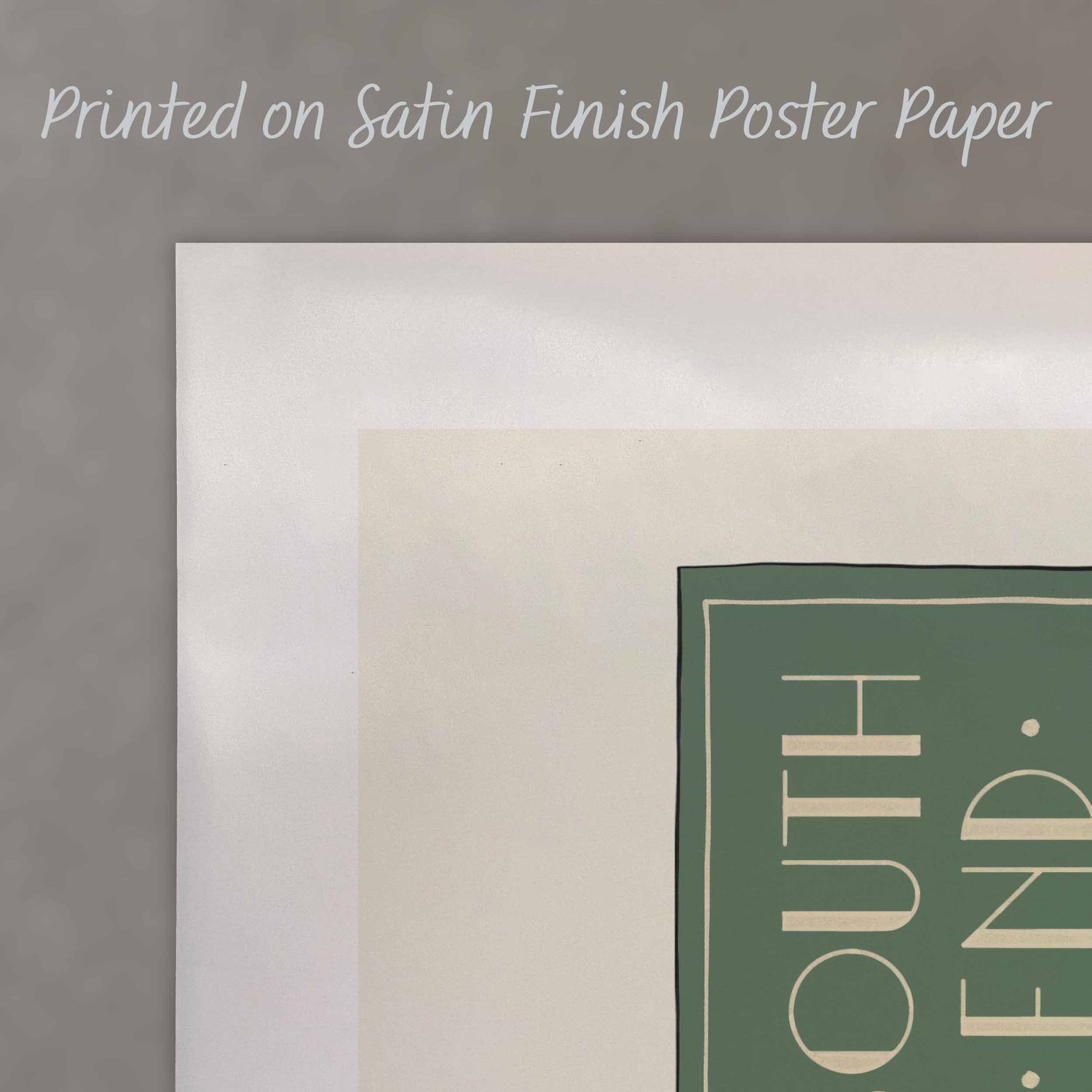 A close up of a poster with text saying “Printed on Satin Finish Poster Paper”