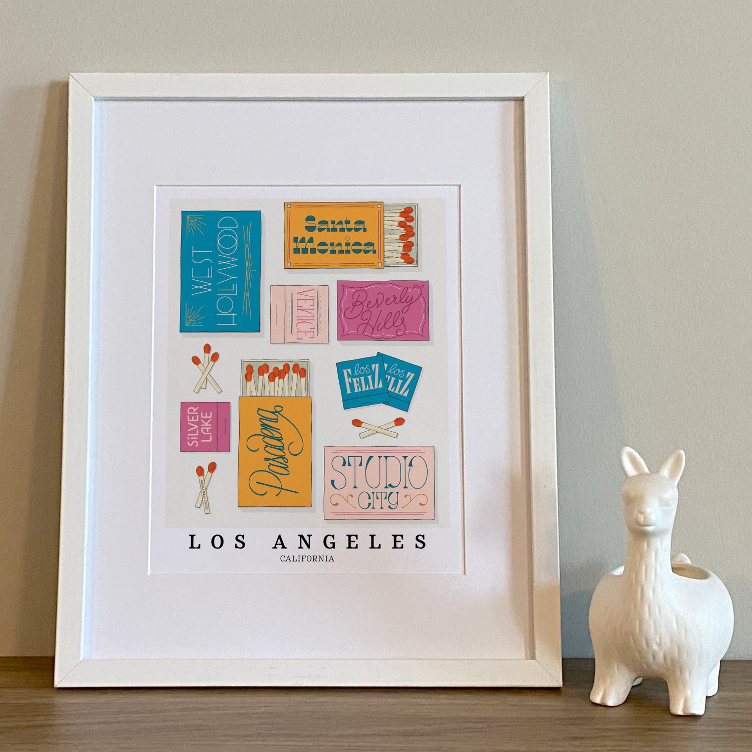 Los Angeles neighborhood matchbox art print with playful hand-lettered typography in the Bold and Bright color palette