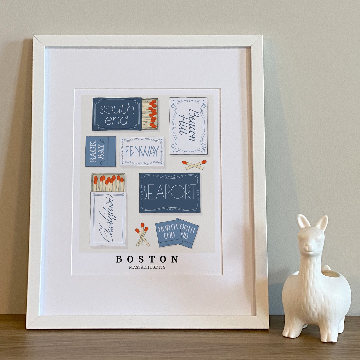 Hand-drawn Boston matchbox art print with neighborhoods drawn in representative lettering styles.