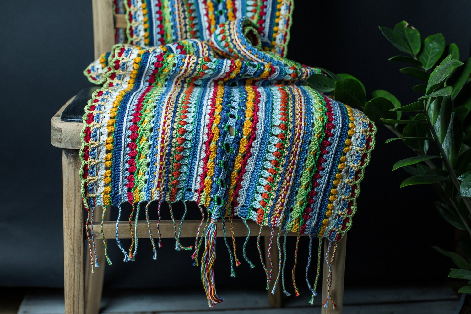 This stash-friendly crochet scarf pattern is designed to utilize leftover fingering weight yarn.