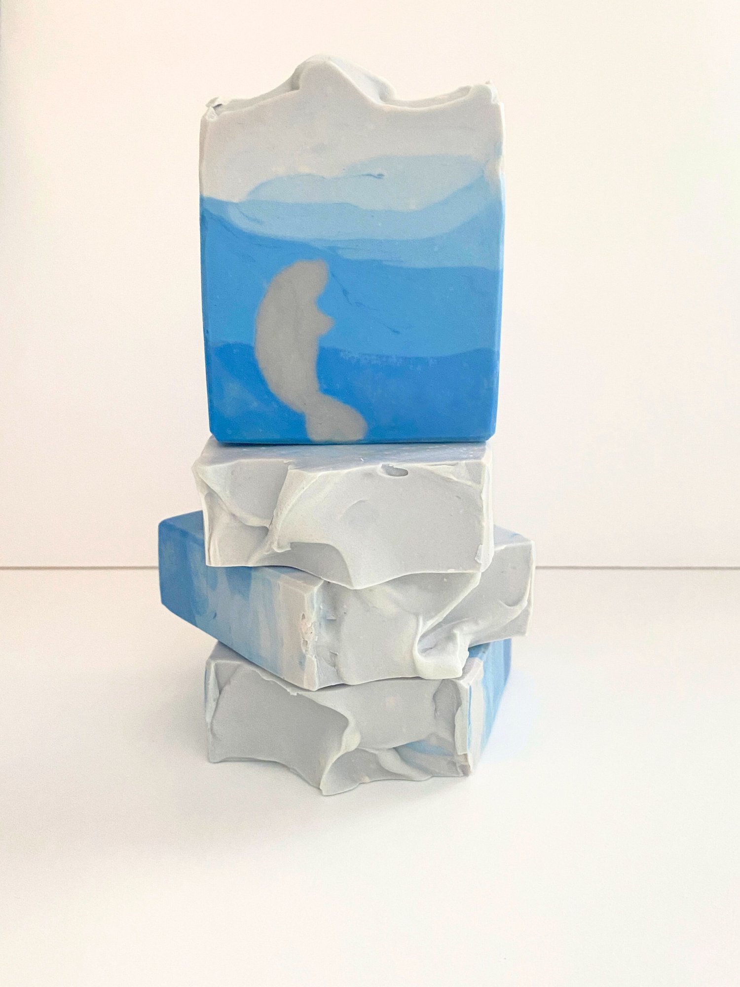 Stack of soap bars depicting a manatee under the water