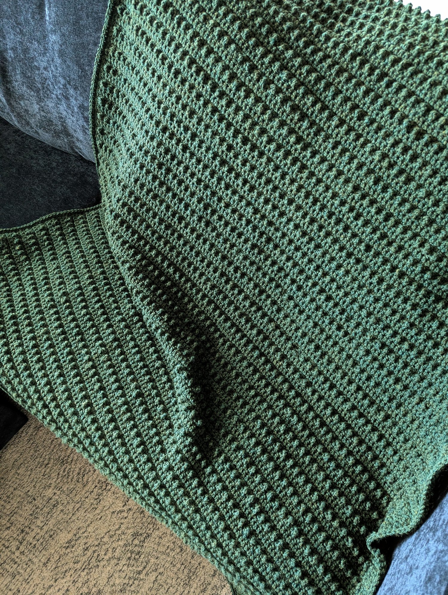Evergreen crochet blanket from top view