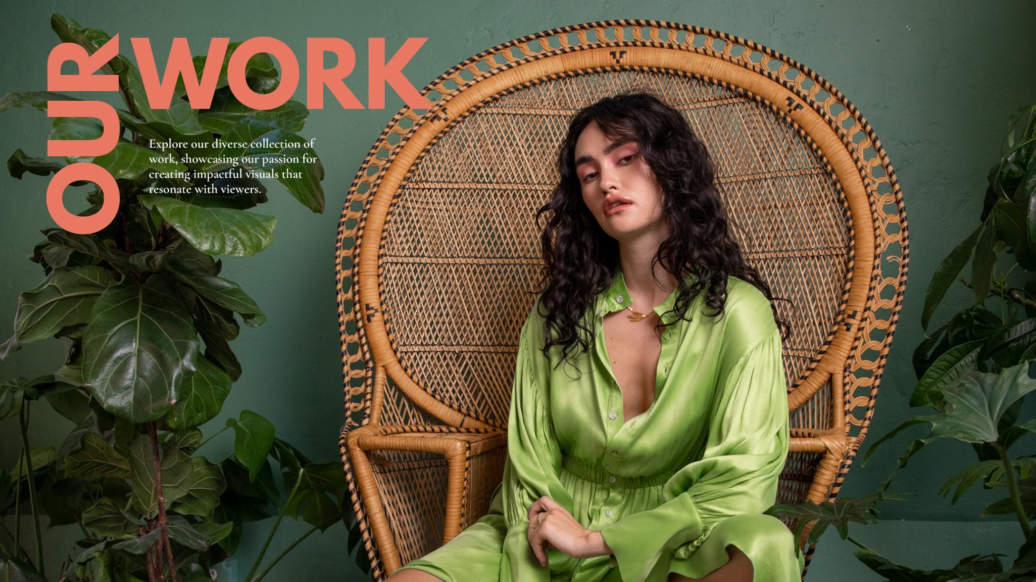 A woman with long curly hair in a green satin dress sits on a wicker chair surrounded by green plants. Large text reading YOUR WORK is displayed in the top left corner of a pitch deck slide.