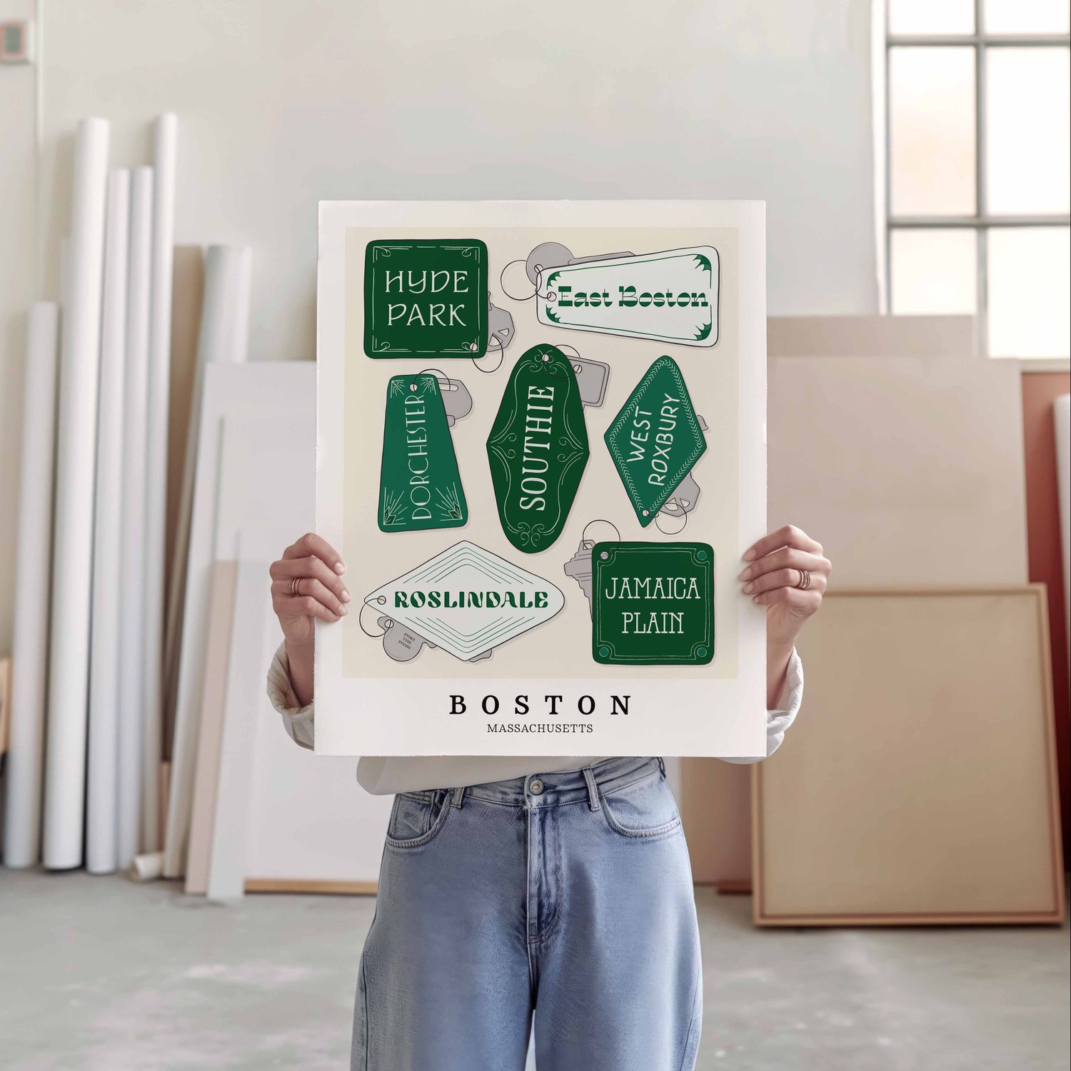 A person holding a poster of several key fobs