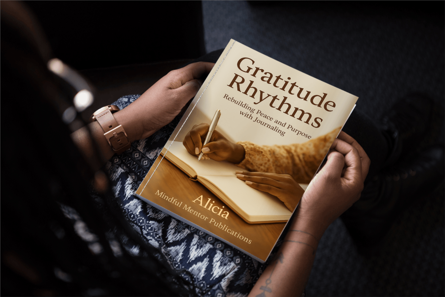 a woman holding the Gratitude Rhythms book