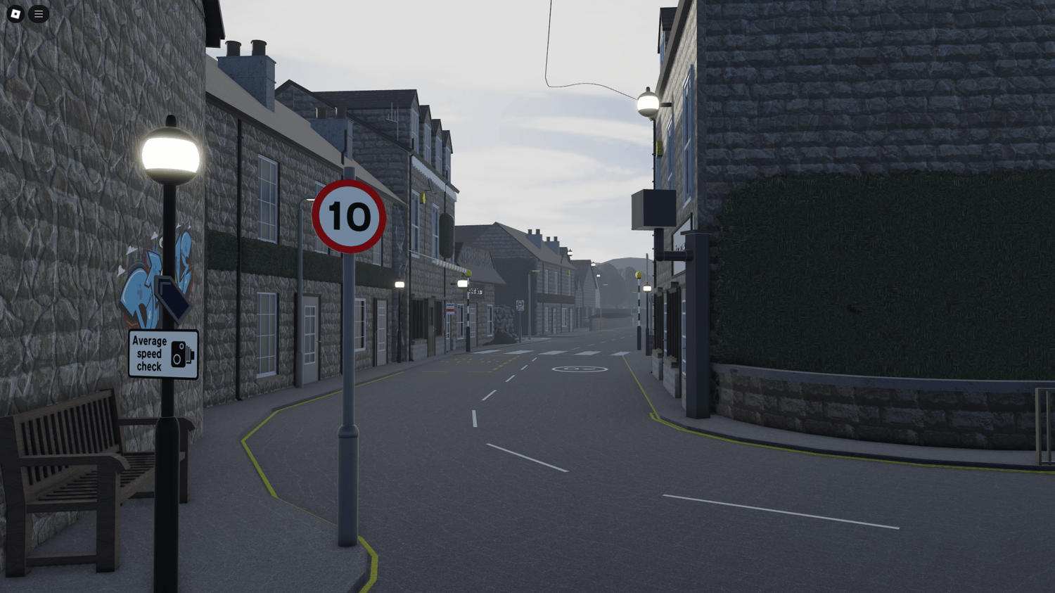 Cobblestone street with houses and Welsh-style architecture