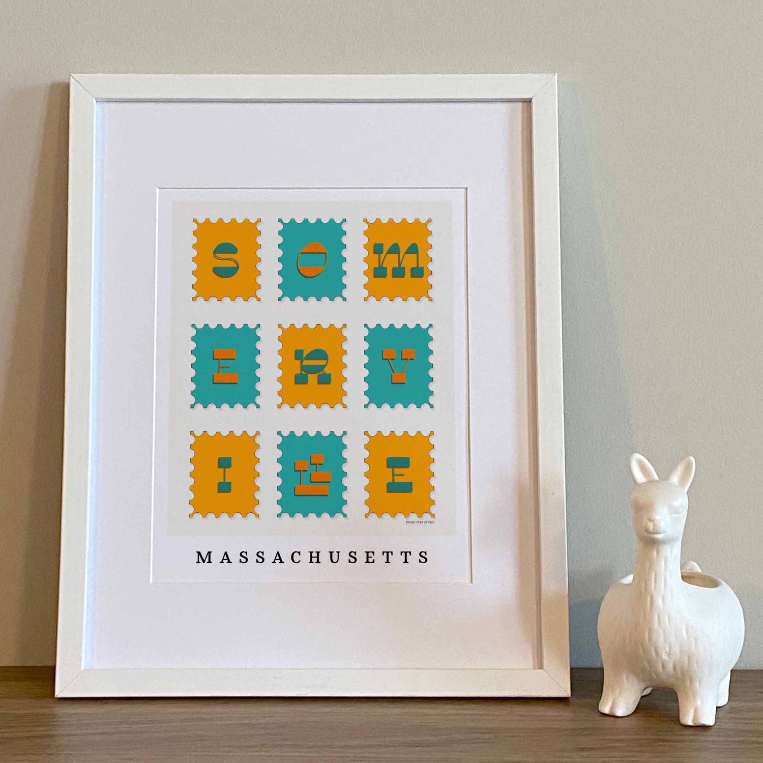 Hand-drawn Somerville wall art featuring a postage stamp–style design with funky inverted contrast lettering in bold blues and oranges.
