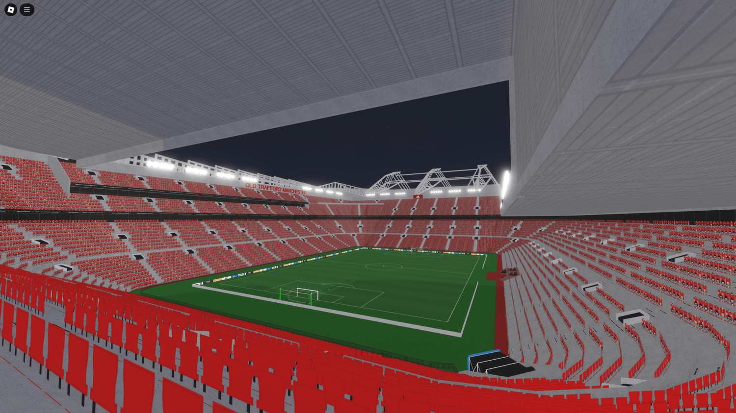 Wide view of Trafford Stadium with fully modeled soccer field and massive seating stands.