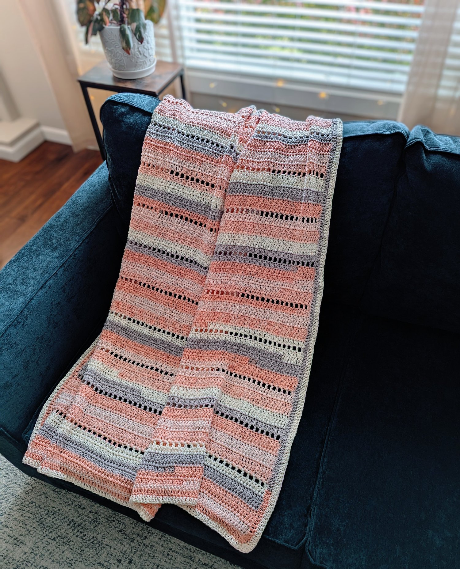 Pink Sands Crochet Blanket Pattern on Couch