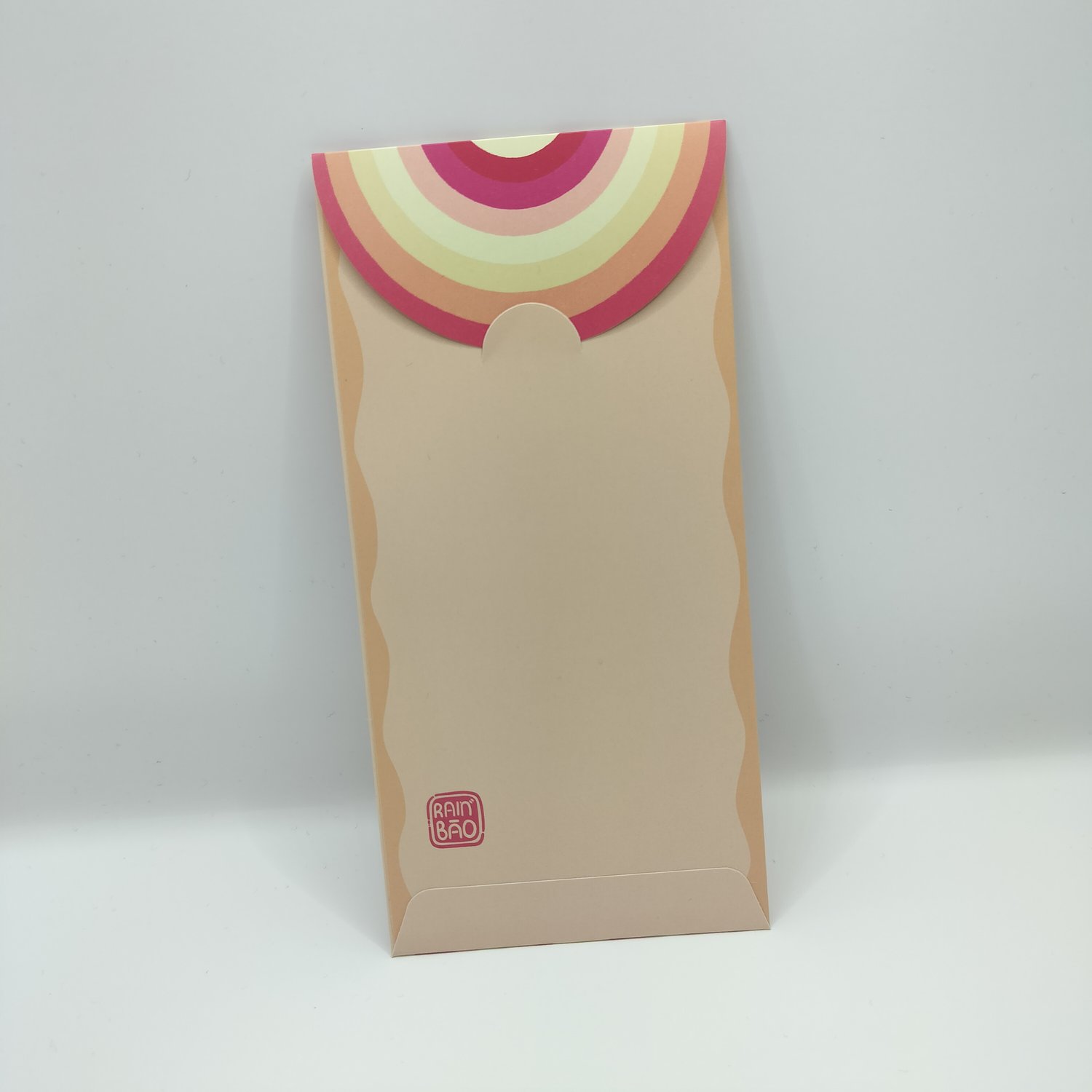 The back of a colorful hongbao with retro rainbow stripe pattern in pink and yellow tones on the closing flap.
