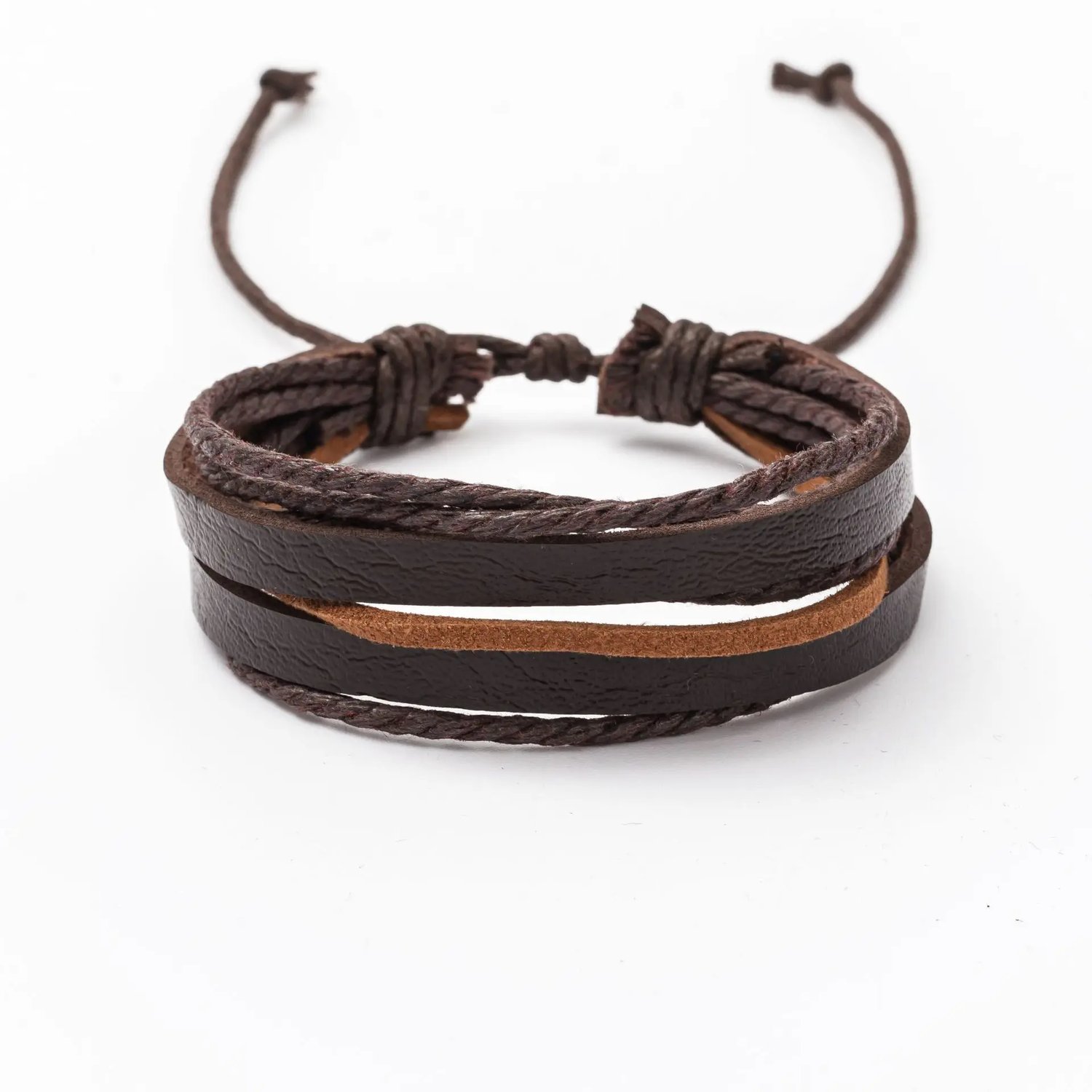 et of four adjustable mens bracelets in dark brown, including wooden bead designs and leather strap bracelets with metallic accents, displayed on a white surface. Part of a 4pcs Brown Braided Leather Bracelet Set.