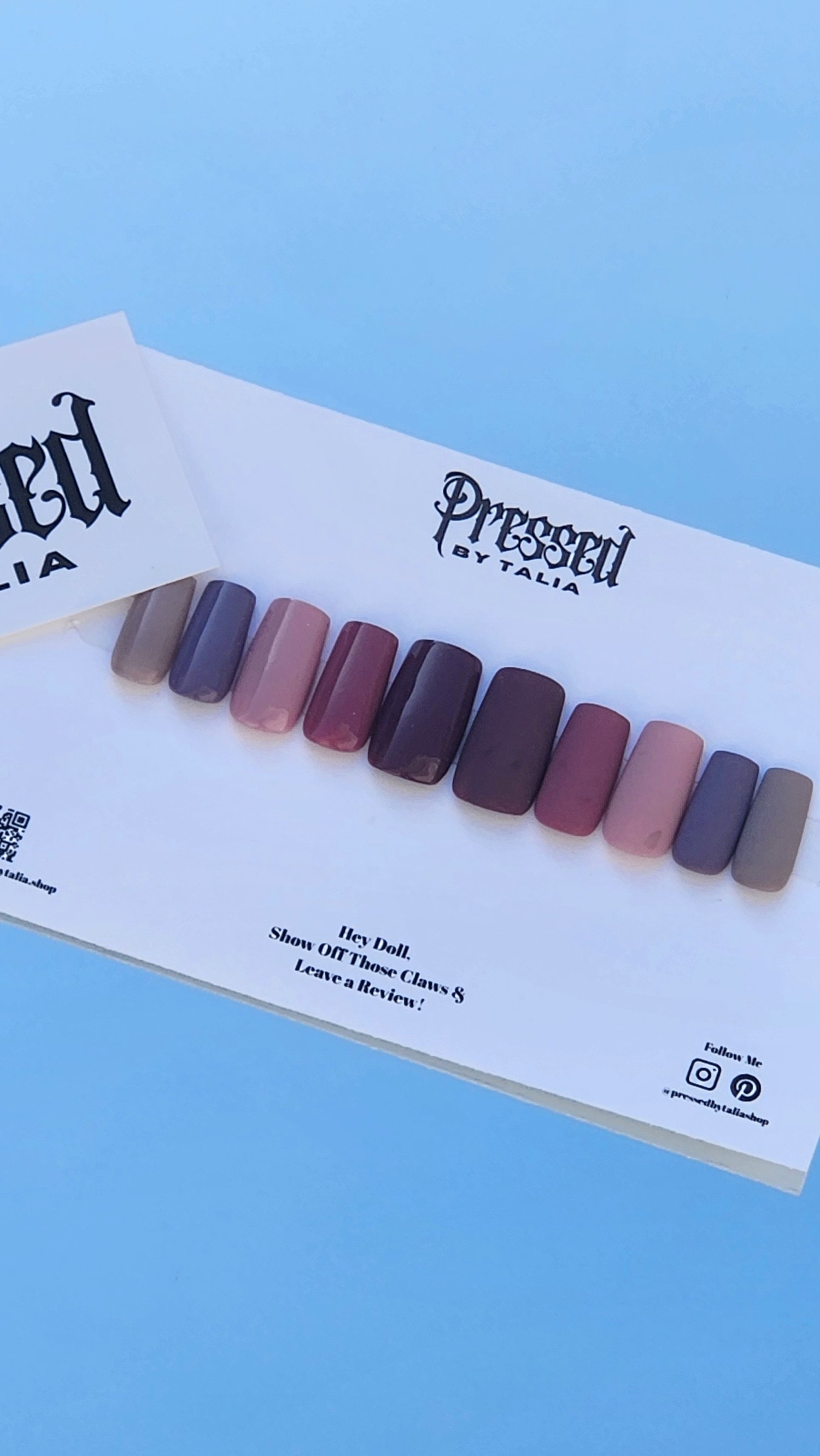 Short square shaped press-on nails showing a variety of shades of nude, displayed on a Pressed By Talia branded card