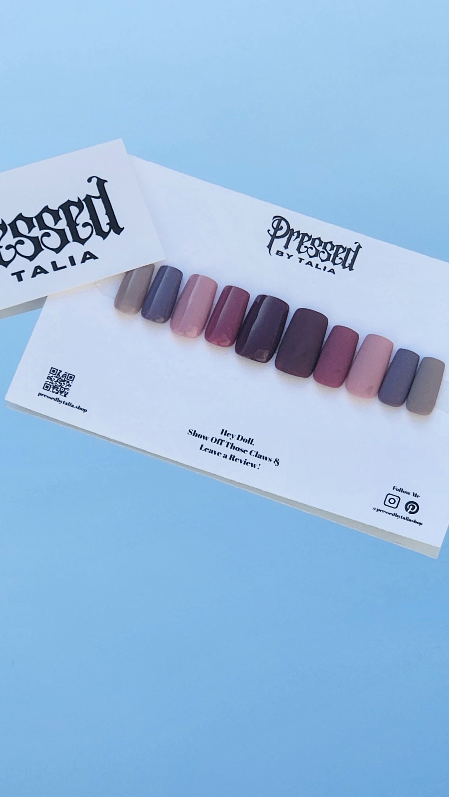 Short square shaped press-on nails showing a variety of shades of nude, displayed on a Pressed By Talia branded card