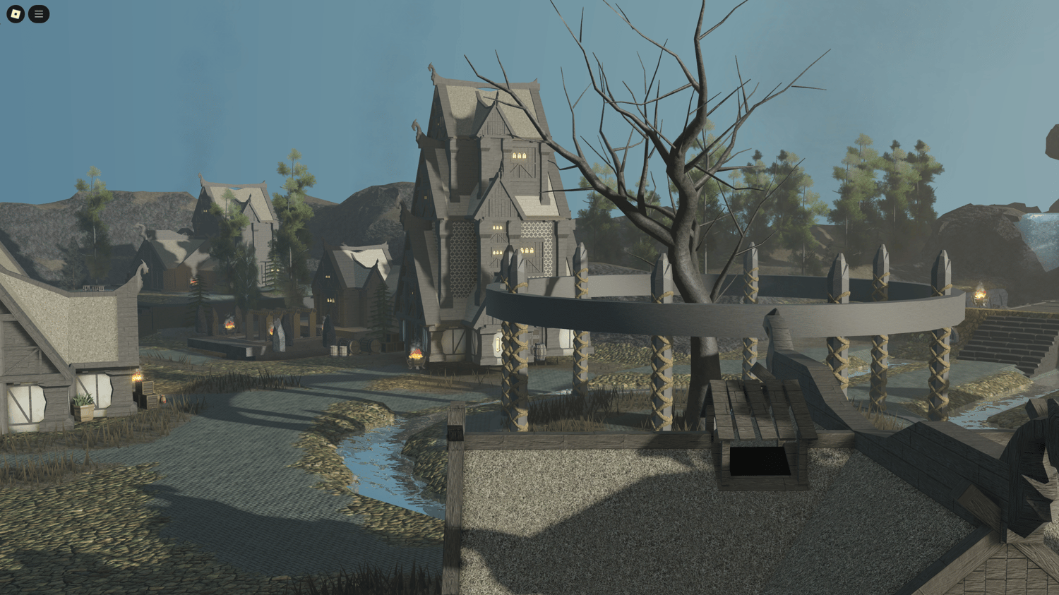 Diverse medieval buildings scattered throughout the map near a riverbank