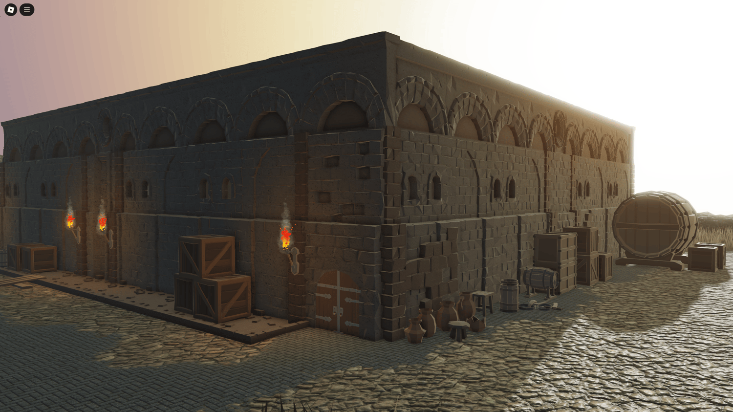 Medieval city gate entrance with defensive walls and watch towers