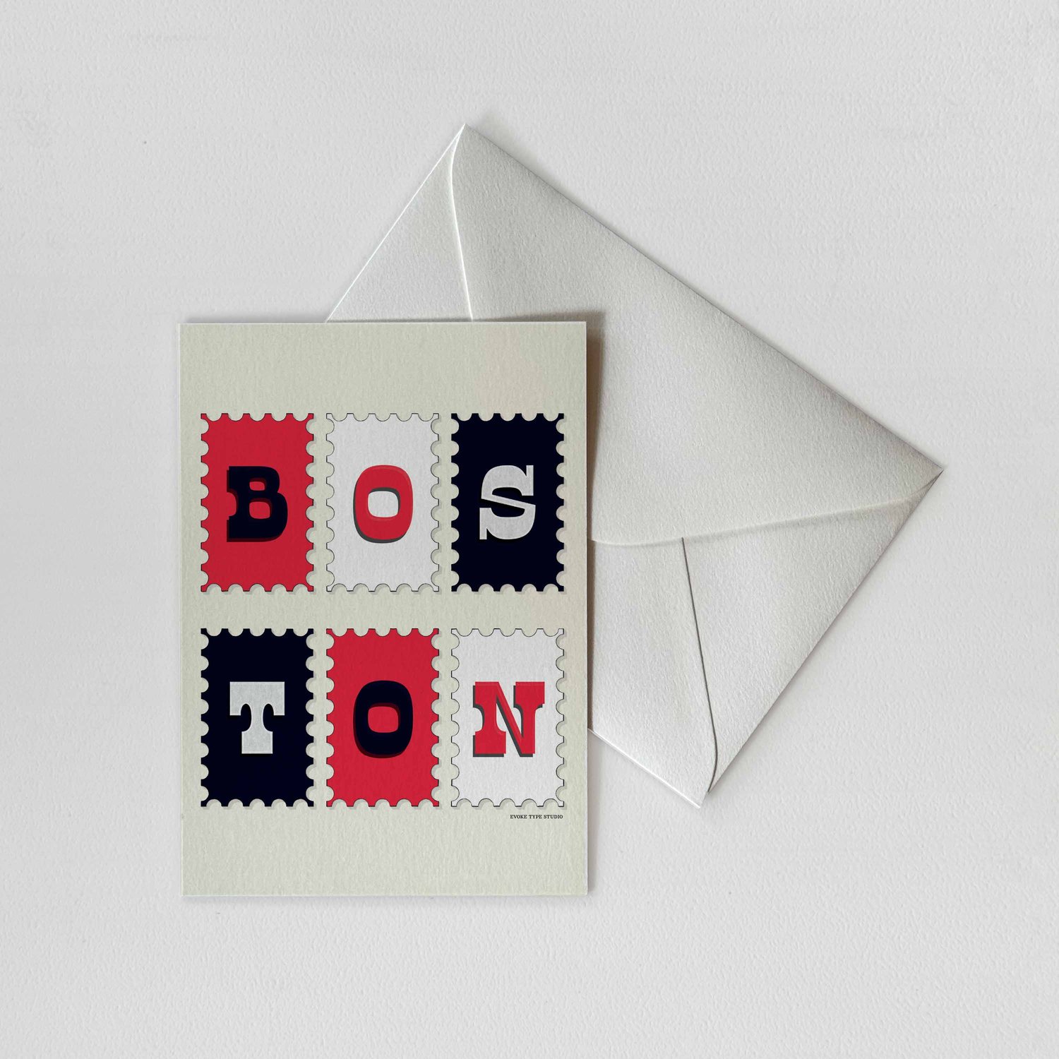 A notecard of postage stamps featuring Boston, Massachusetts drawn in a unique lettering style with a white envelope. Artwork has a patriotic color scheme of red, white and blue