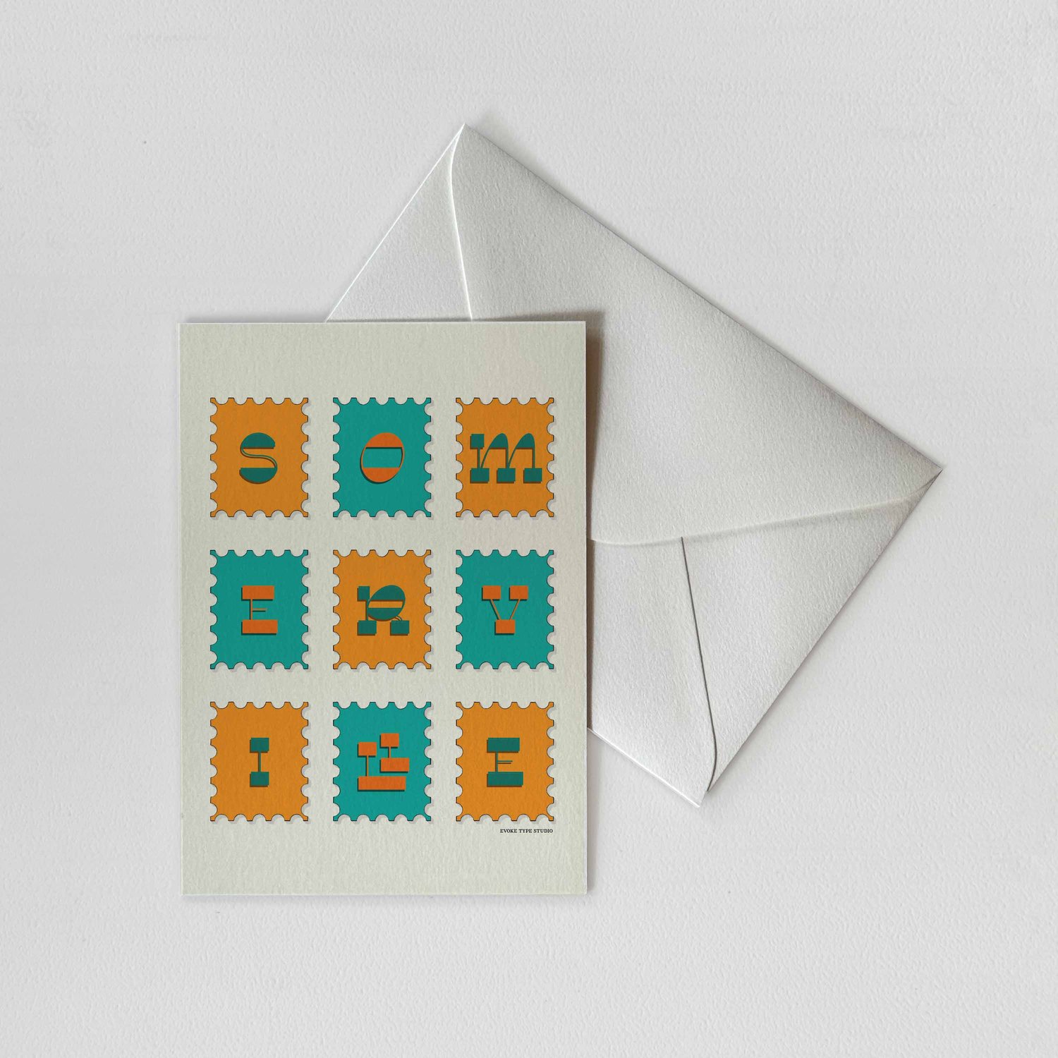 A notecard of postage stamps featuring Somerville, Massachusetts drawn in a unique lettering style with a white envelope. Artwork has a bright blue and orange color scheme