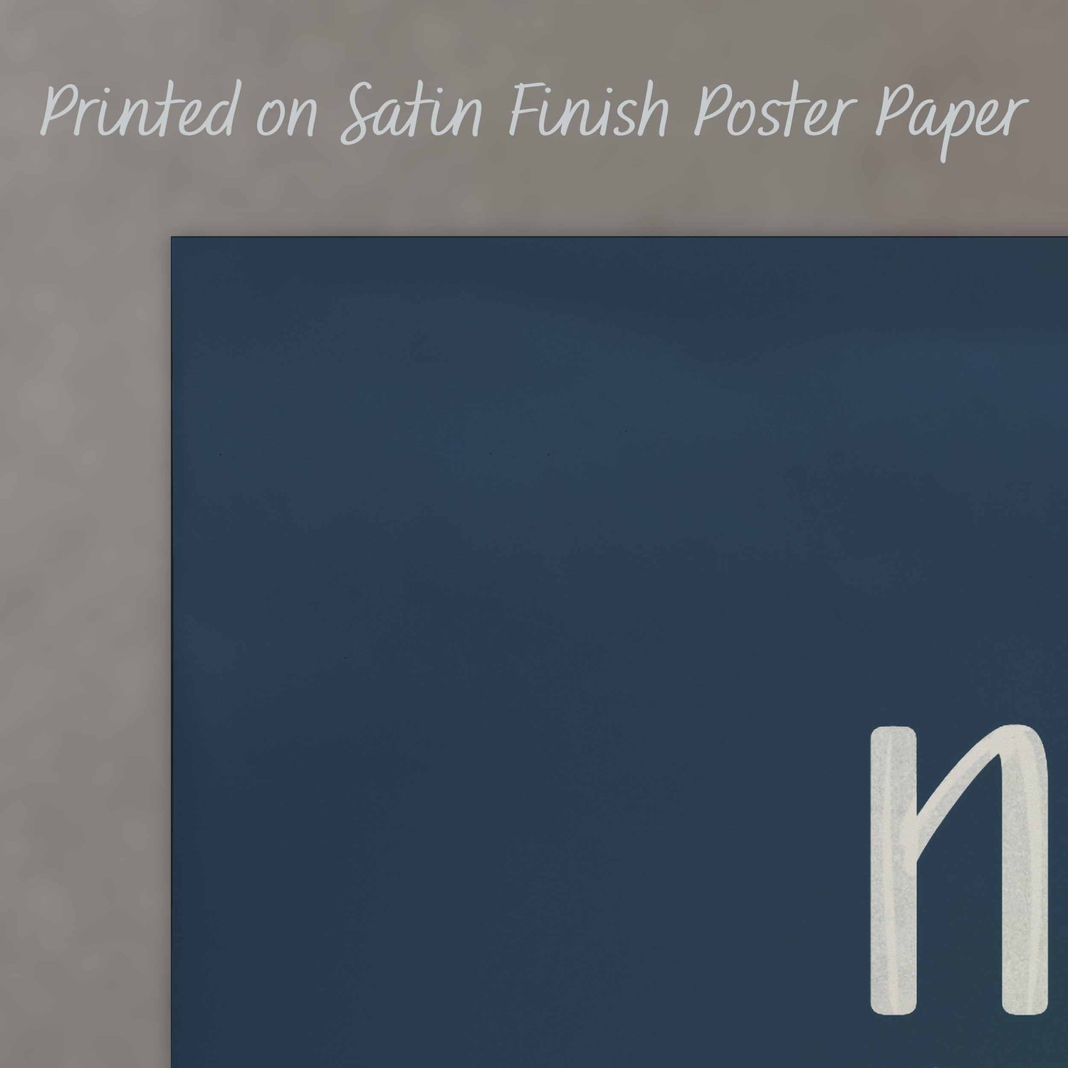 A close up of a poster with text saying “Printed on Satin Finish Poster Paper”