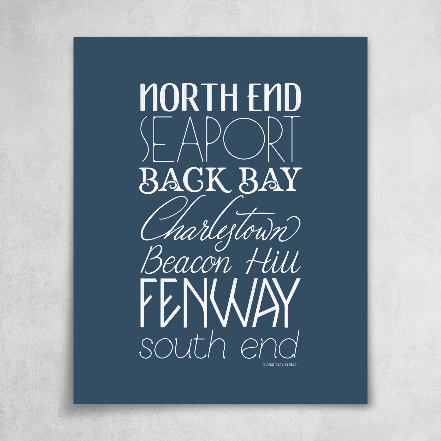 A collection of Boston neighborhoods drawn in various lettering styles. Artwork has a blue and white color scheme.