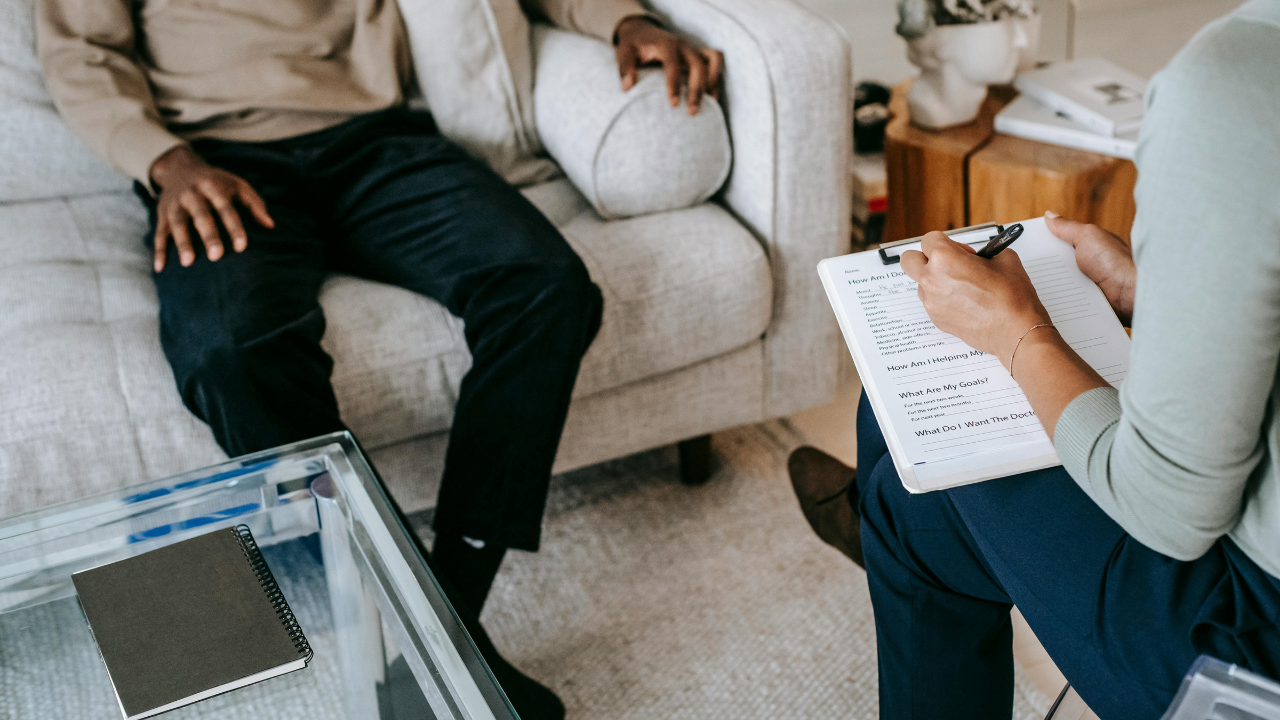Christian man holding a Bible, representing faith and mental health awareness in the Christian community.