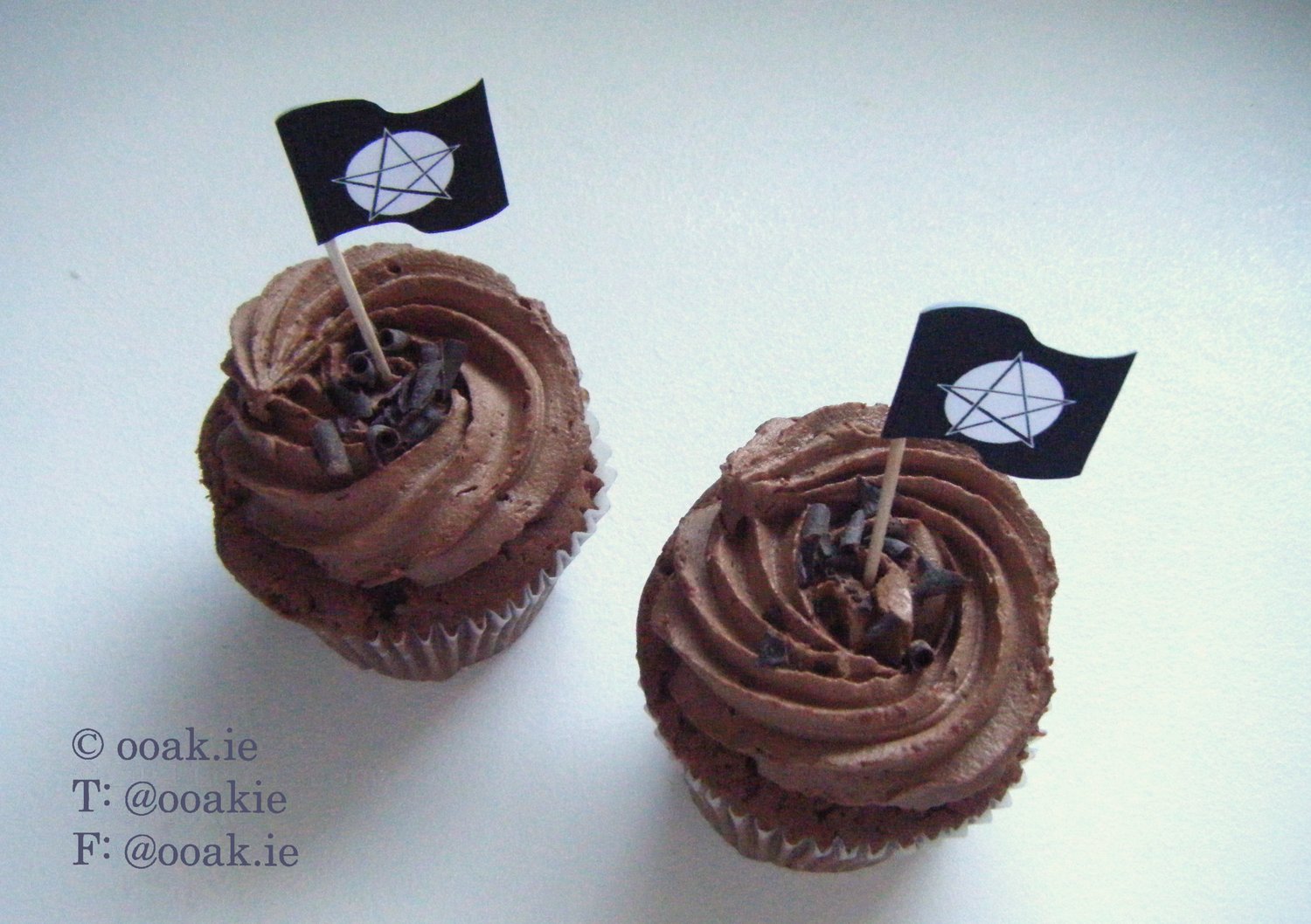 Printable sheet of mini Pentacle flags with a full moon background, shown as DIY celestial cupcake toppers.