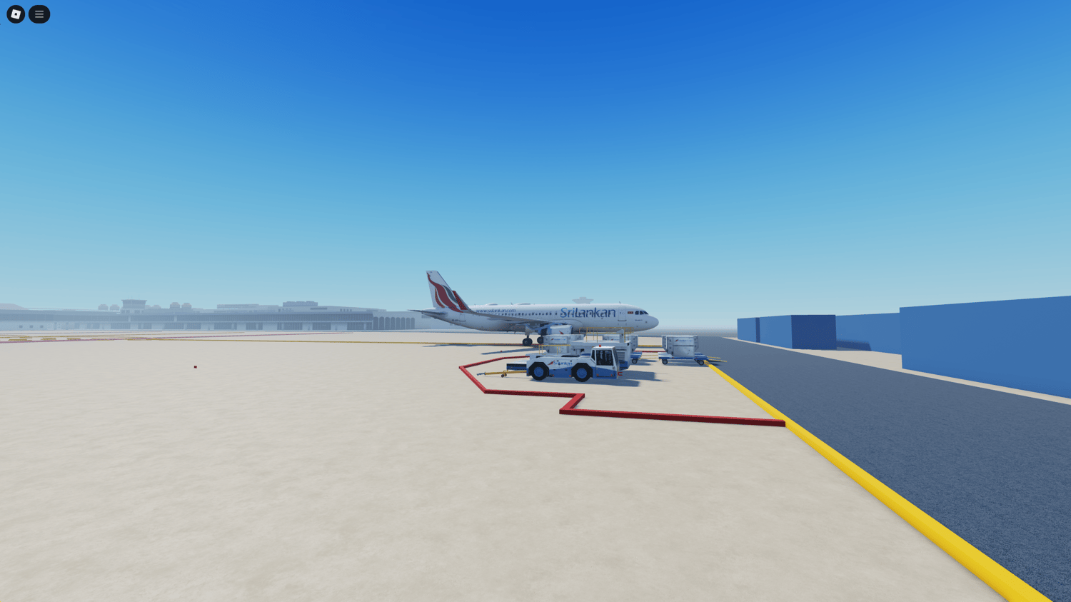 Assorted airport vehicles near terminal in Roblox