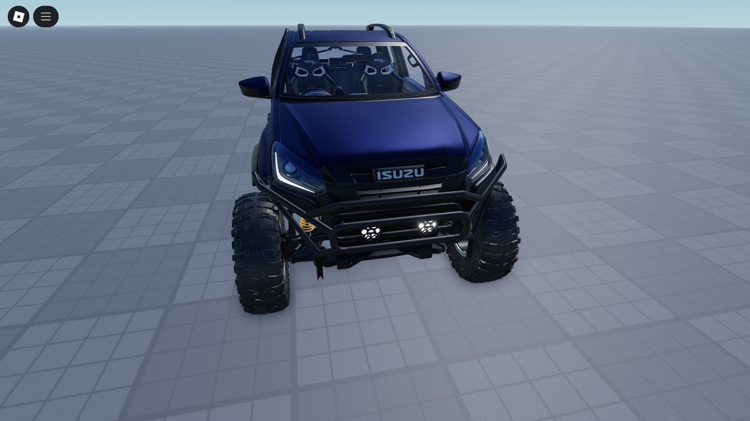 Rear shot showing oversized suspension and tires